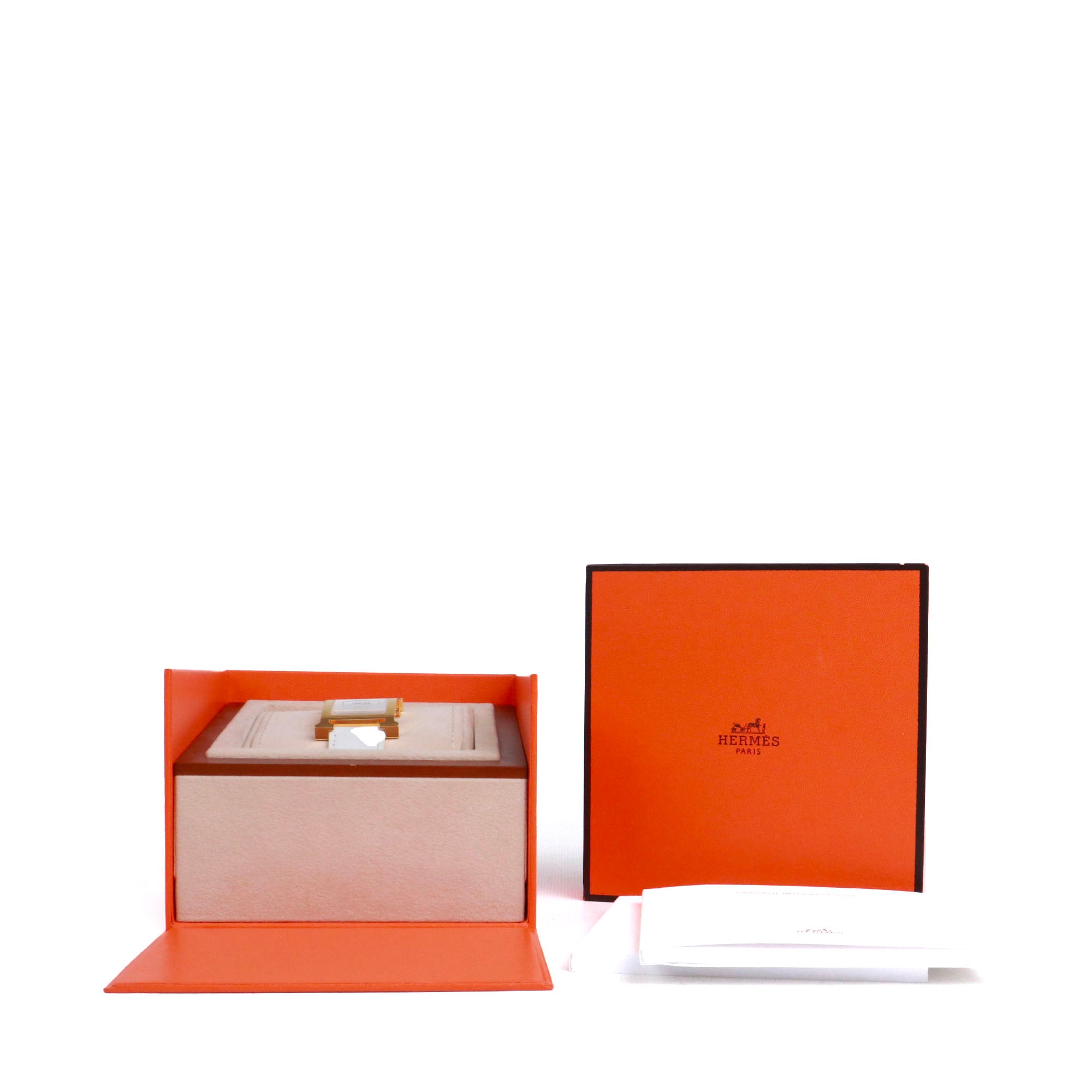 HERMÈS - Montre Heure H Hermès moyen modèle en or et cuir blanc