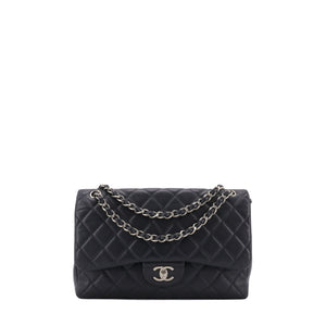 CHANEL - Sac à bandoulière Classique/Timeless Jumbo Chanel en cuir grainé bleu marine
