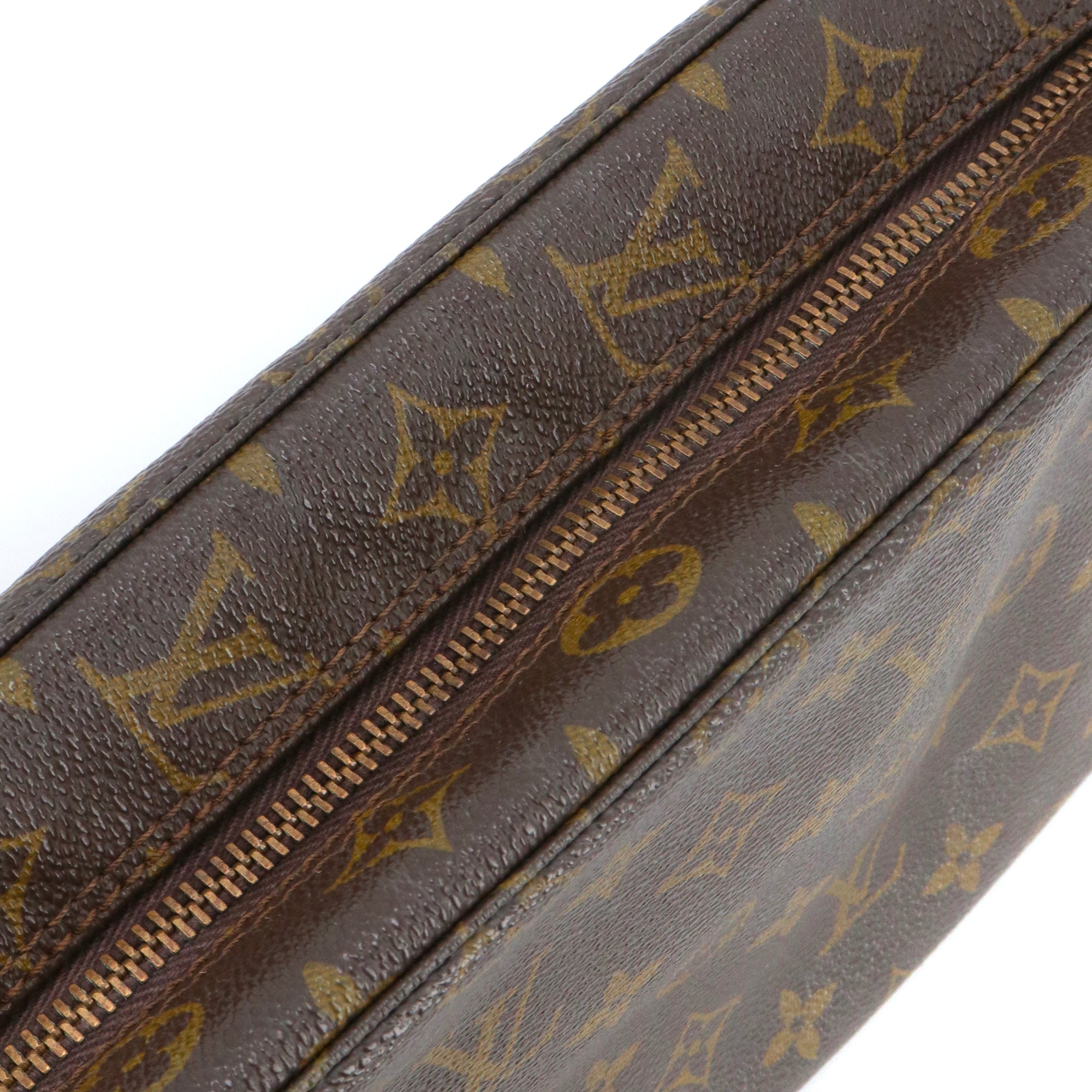 LOUIS VUITTON - Trousse de toilette Louis Vuitton en toile enduite vintage