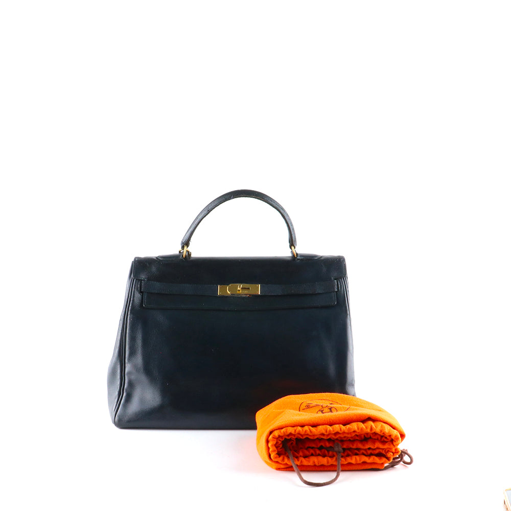HERMÈS - Sac à main Kelly 35 en cuir box bleu nuit