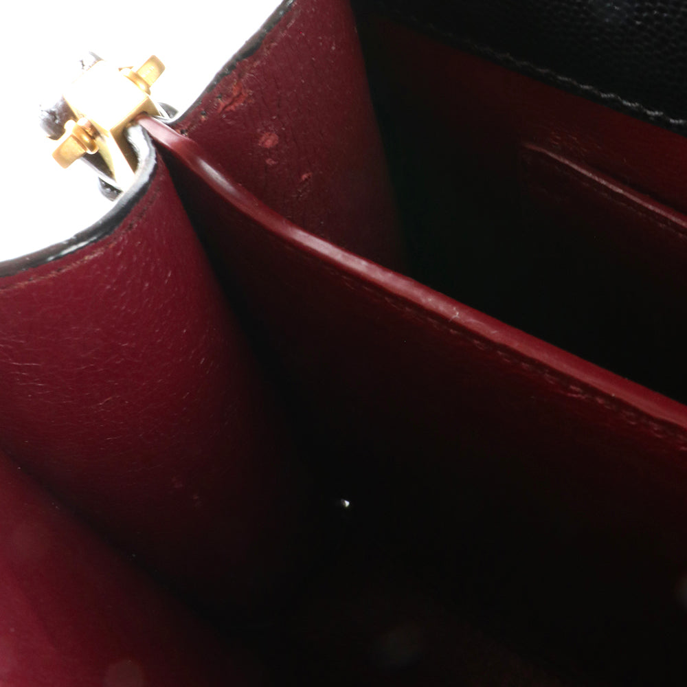 SAINT LAURENT - Sac à bandoulière Cassandra mini Top Handle en cuir grainé noir