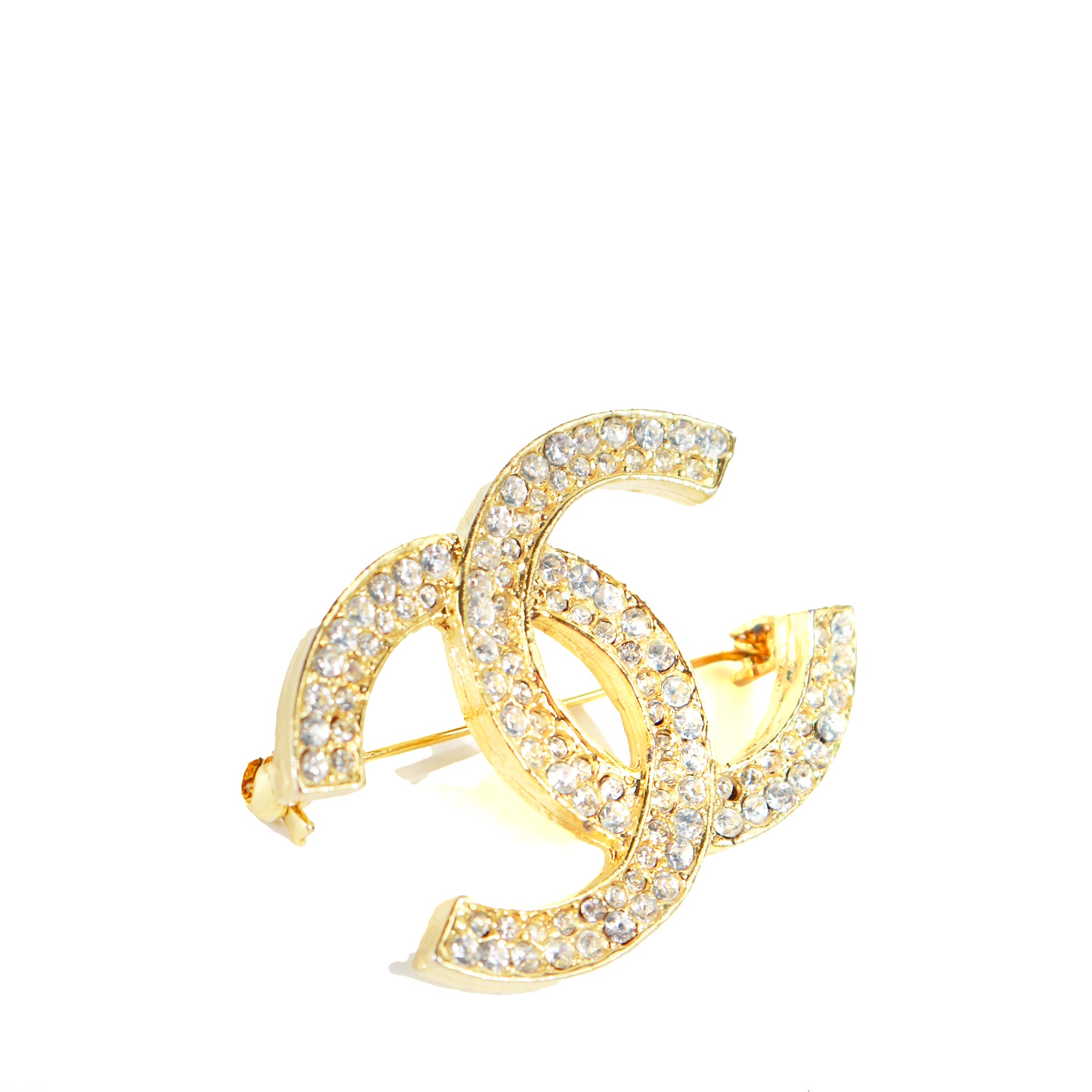 CHANEL - CC brooch in gold metal and vintage rhinestones