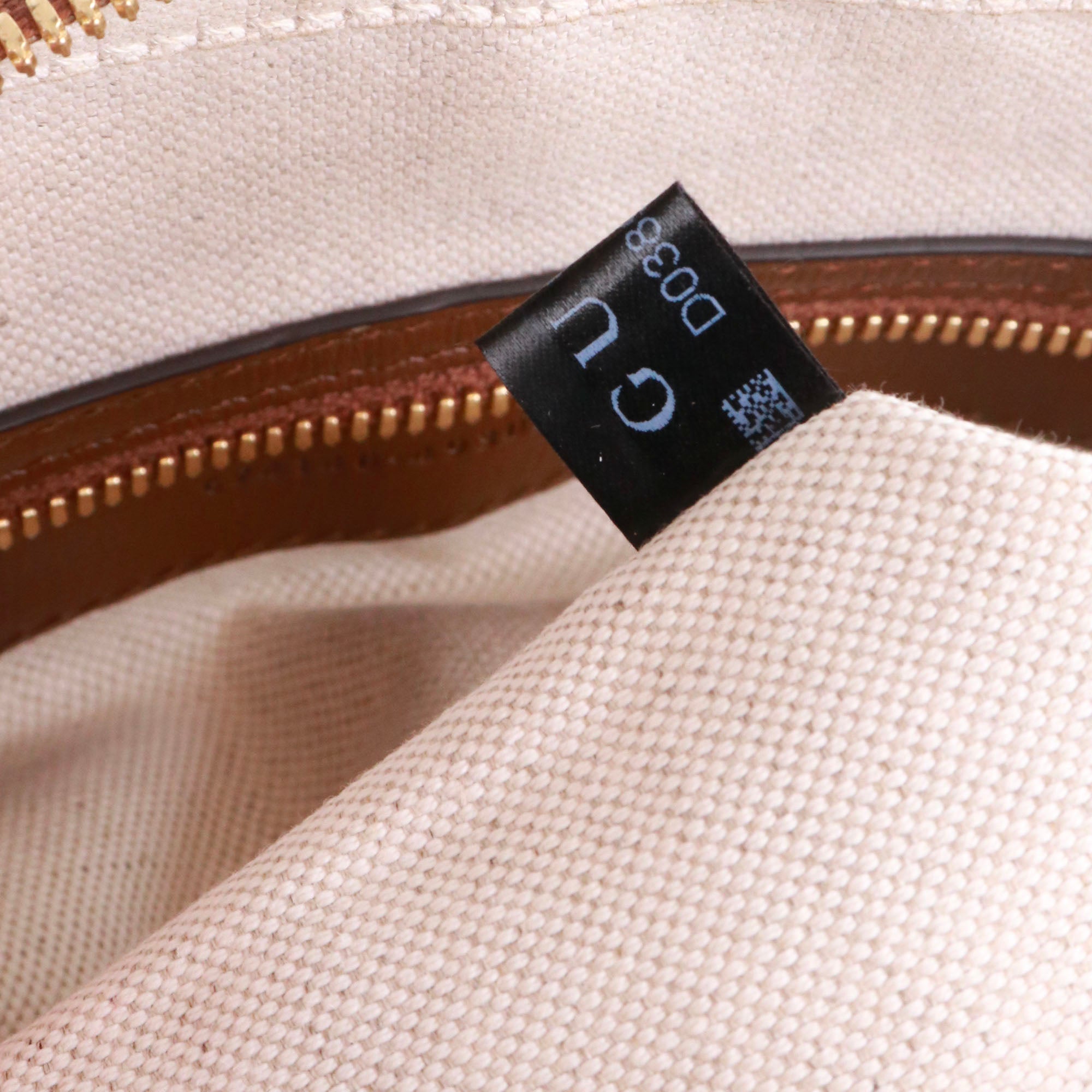 GUCCI - Sac Malette GG Gucci en toile enduite et cuir marron