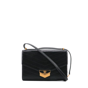 CHANEL - Sac à bandoulière Médaille Chanel en cuir chevron noir