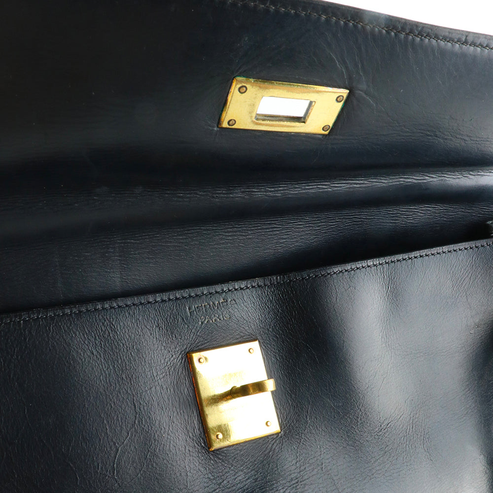 HERMÈS - Sac à main Kelly 35 en cuir box bleu nuit