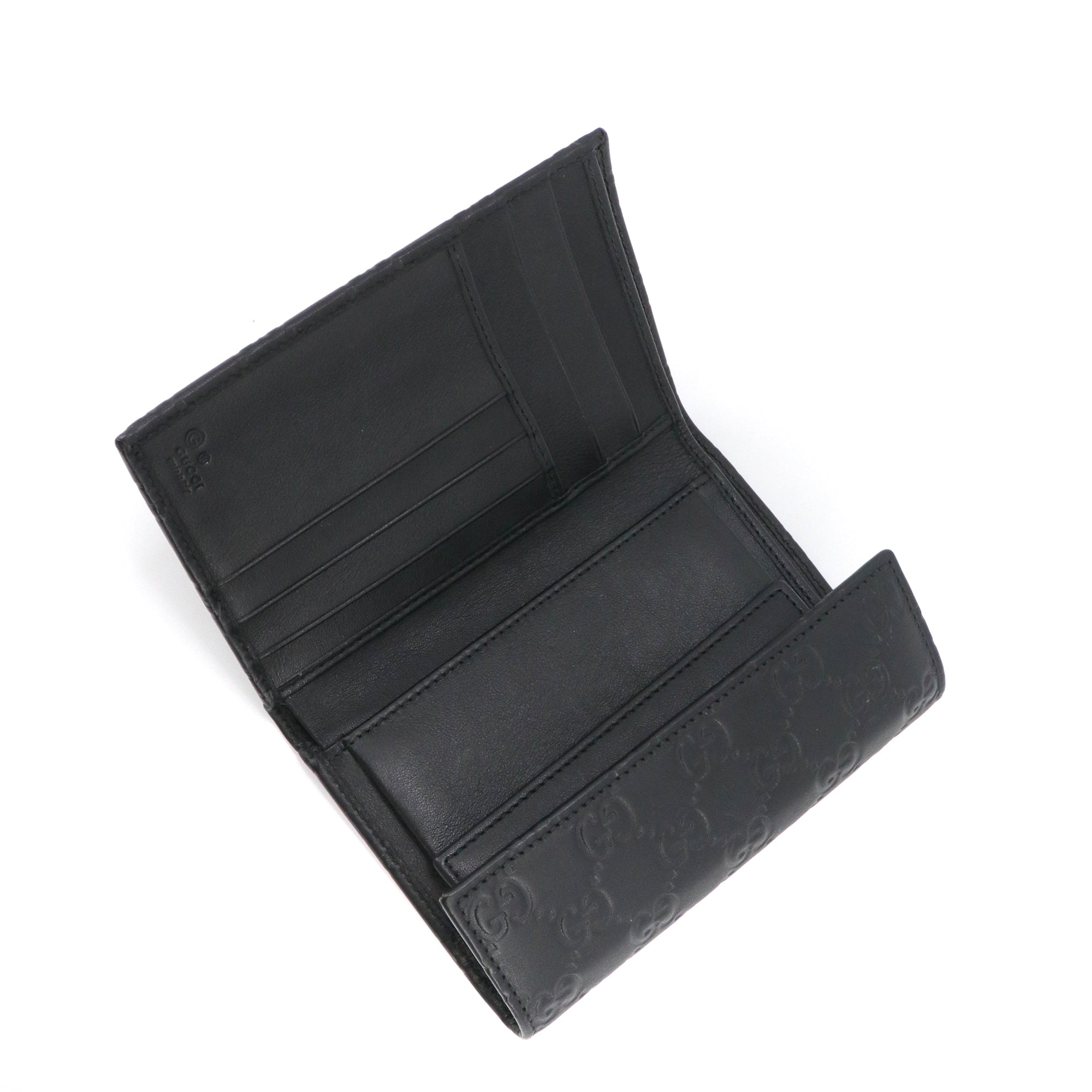 GUCCI - Portefeuille Guccissima Gucci en cuir embossé noir