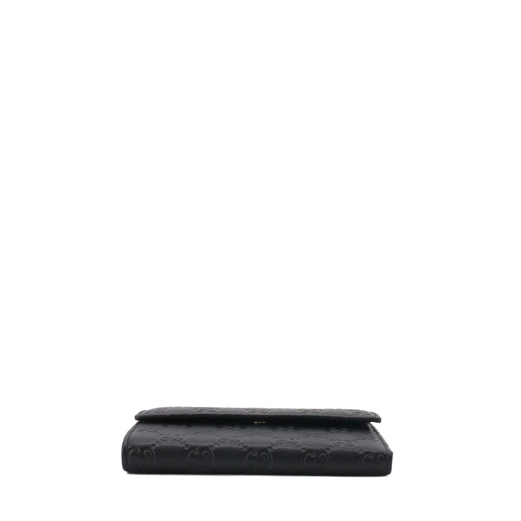 GUCCI - Portefeuille Guccissima Gucci en cuir embossé noir