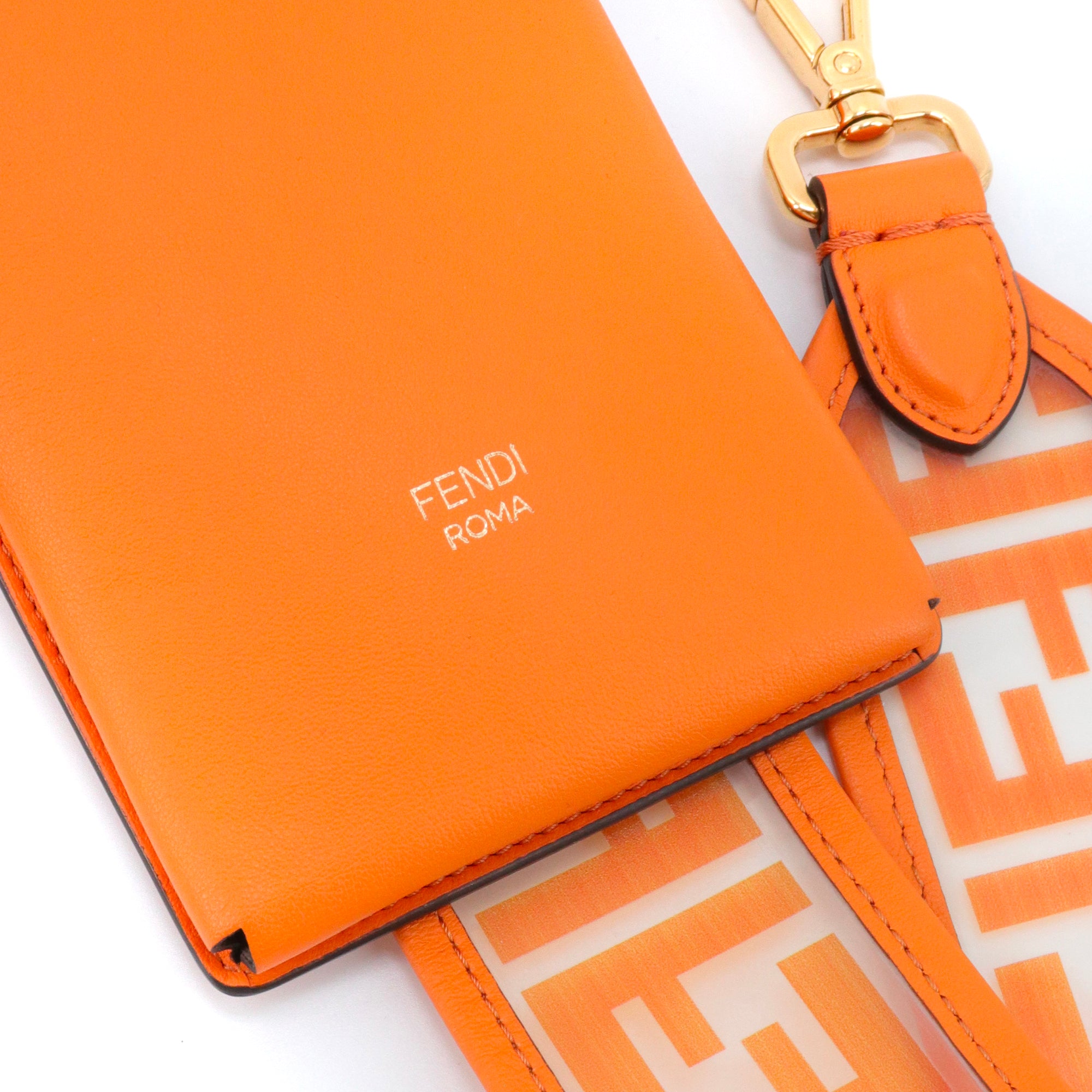 FENDI - Pochette de téléphone à bandoulière FF Fendi en cuir orange et PVC