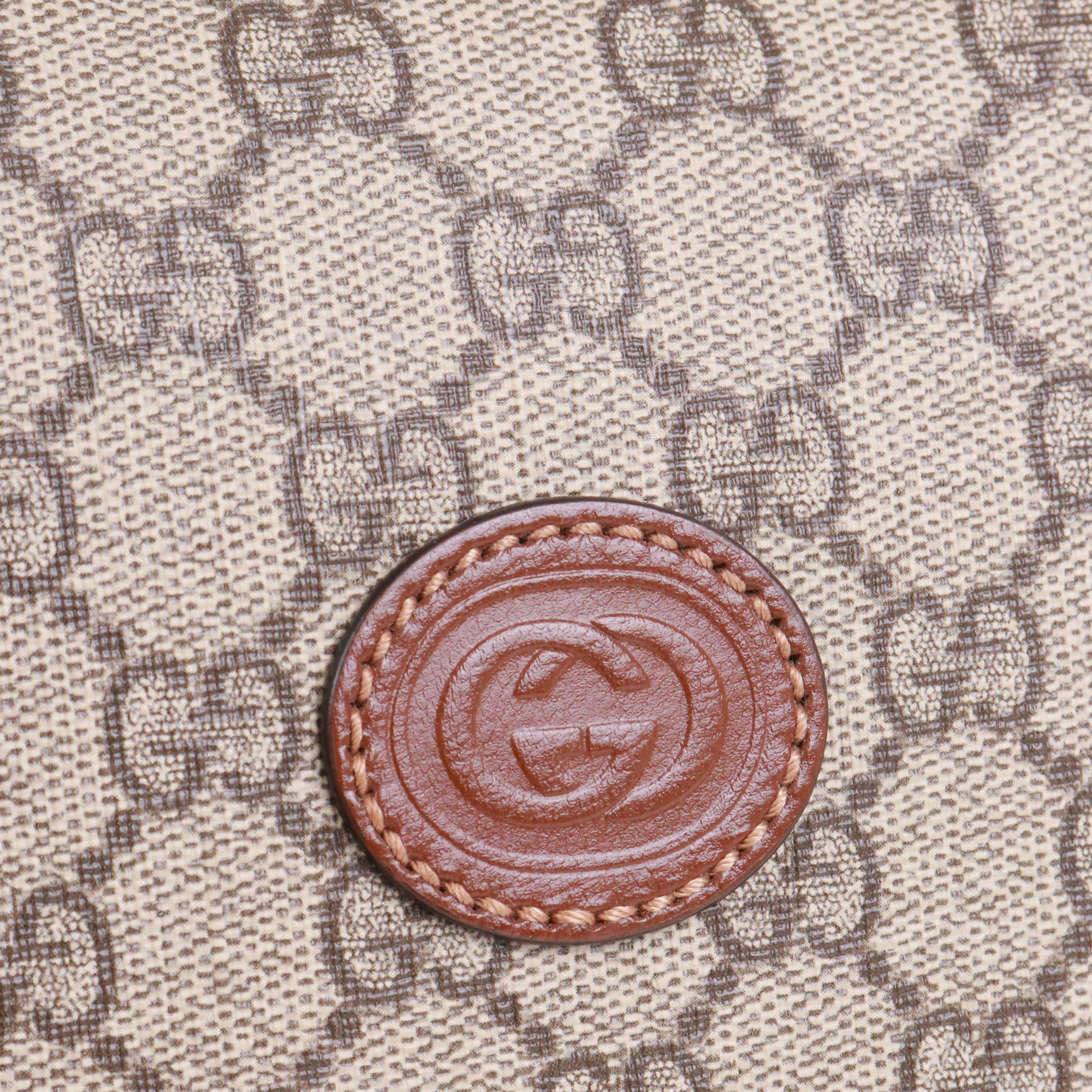 GUCCI - Sac Malette GG Gucci en toile enduite et cuir marron