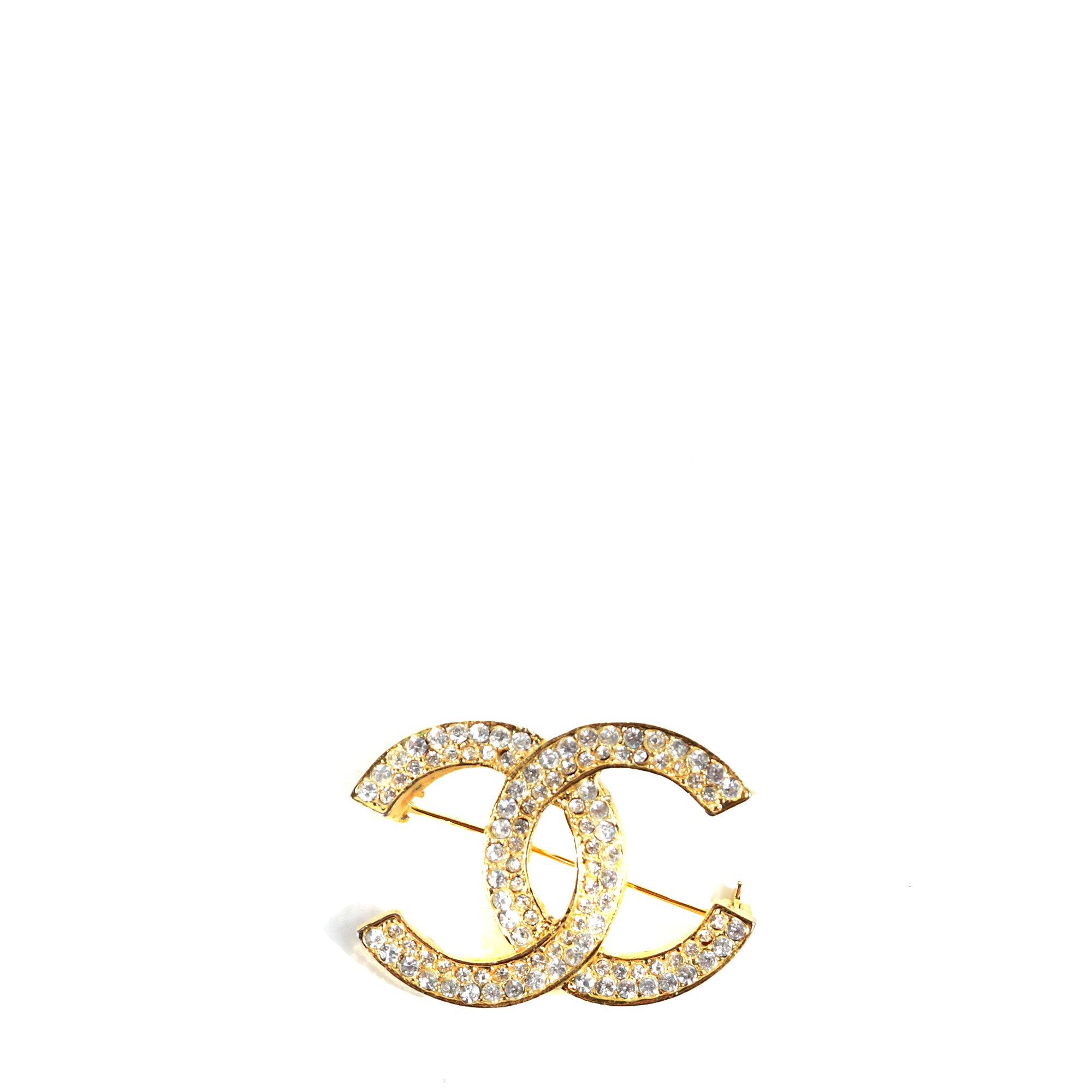 CHANEL - Broche CC en métal doré et strass vintage