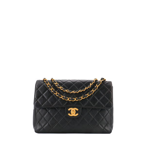 CHANEL - Sac à bandoulière Classique/Timeless Jumbo Chanel en cuir lisse noir vintage