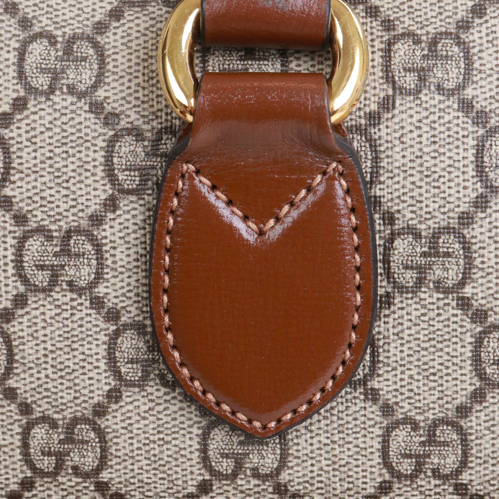 GUCCI - Sac Malette GG Gucci en toile enduite et cuir marron