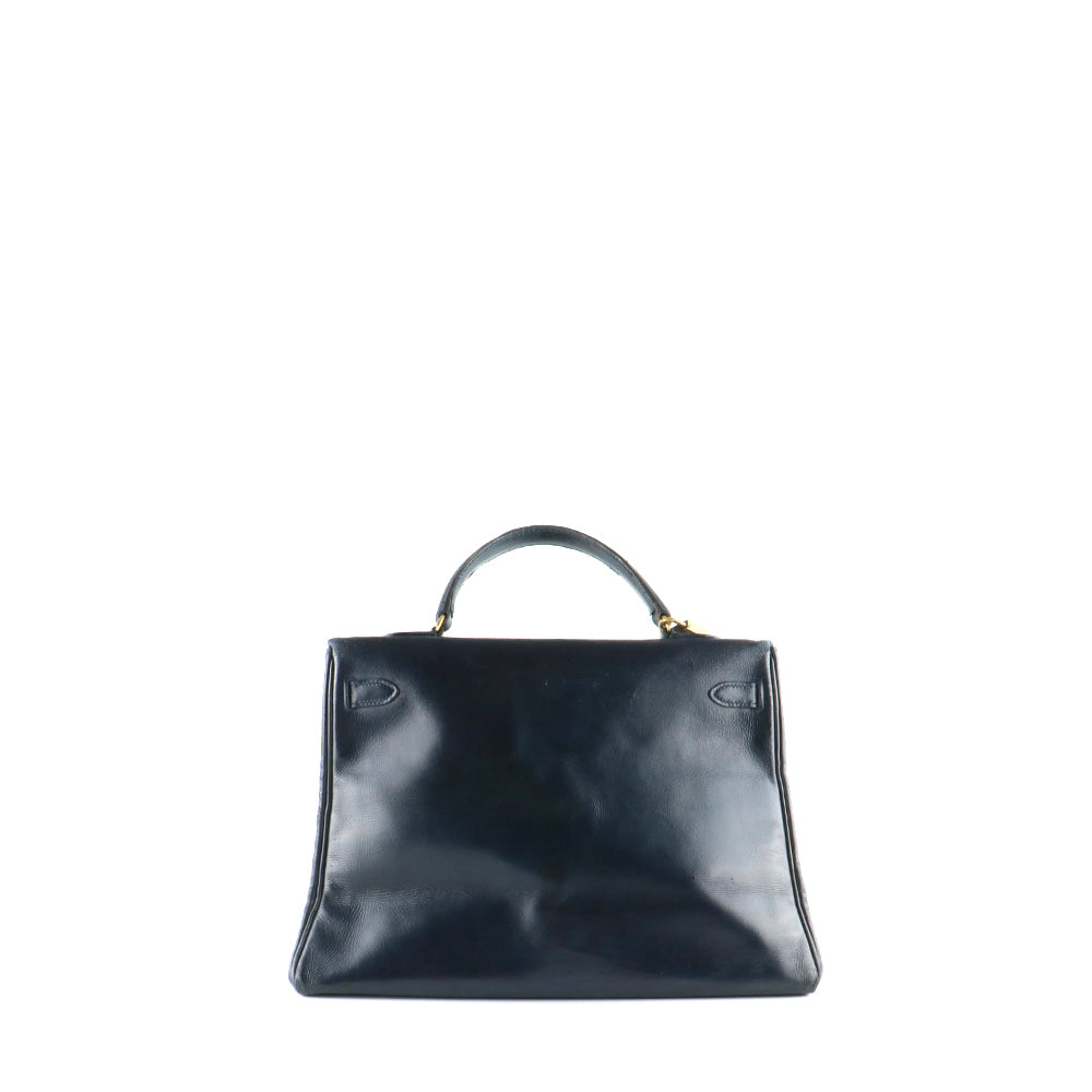 HERMÈS - Sac à main Kelly 35 en cuir box bleu nuit