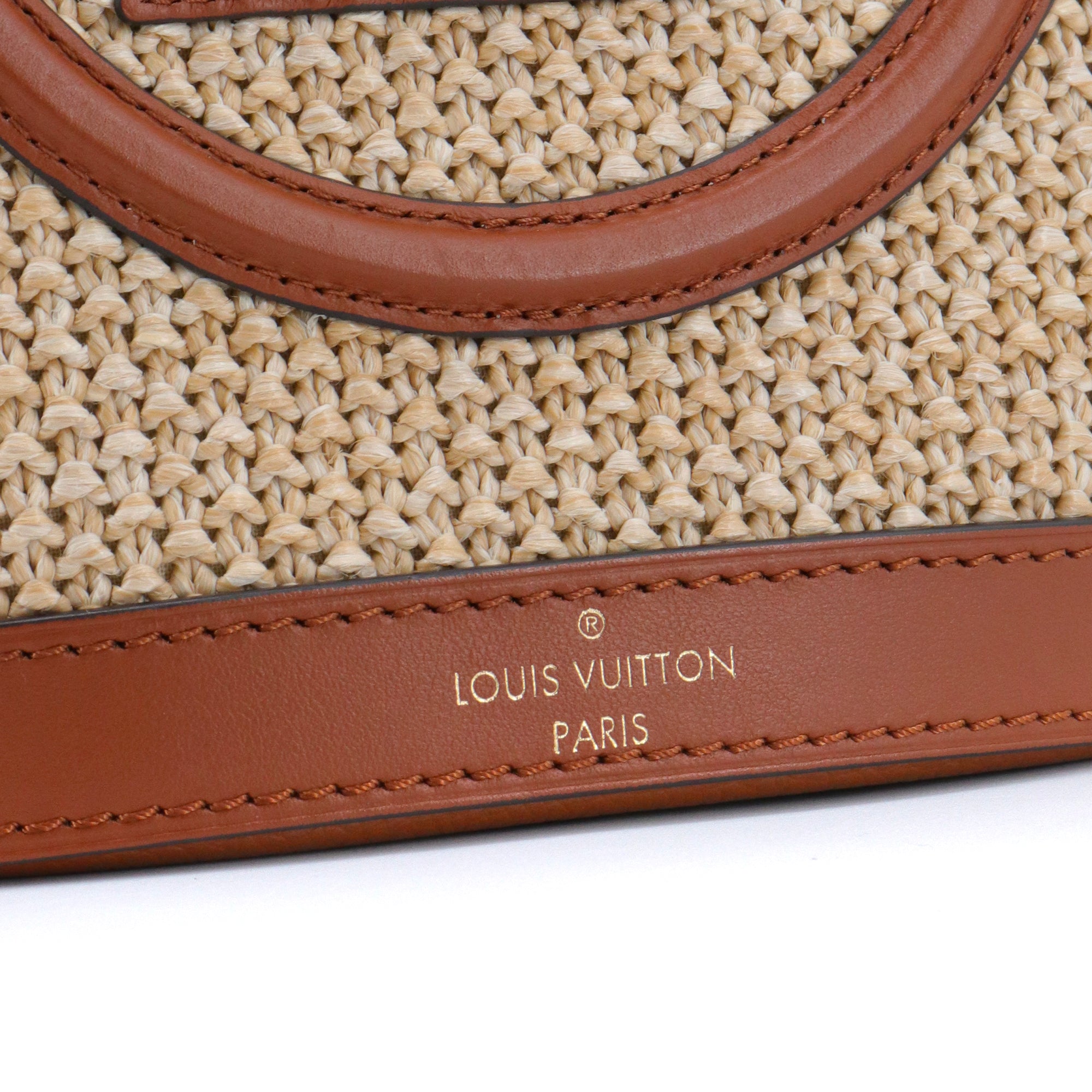 LOUIS VUITTON - Louis Vuitton Petit Bucket shoulder bag in woven raffia and brown leather