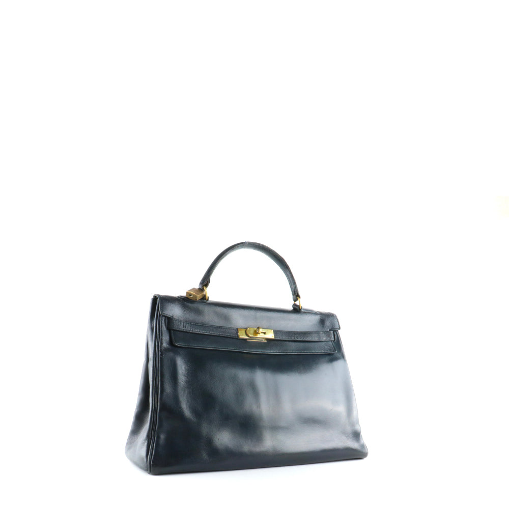 HERMÈS - Sac à main Kelly 35 en cuir box bleu nuit