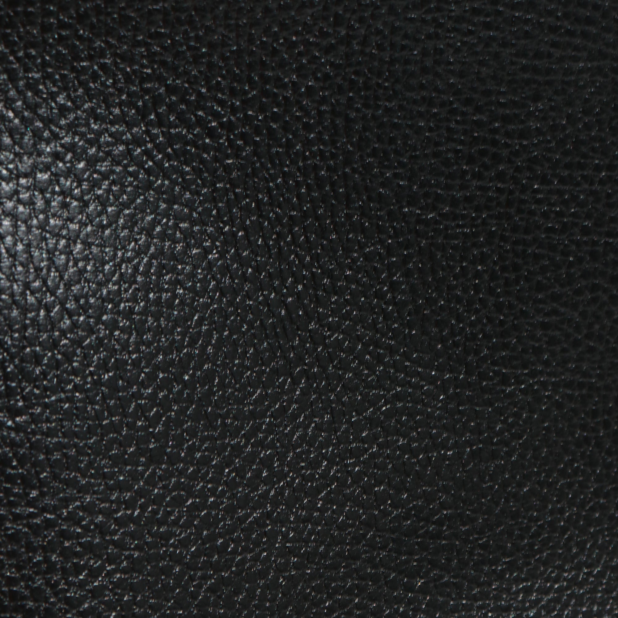HERMÈS - Sac à main Kelly 35 en cuir togo bicolore noir et gold