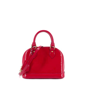 LOUIS VUITTON - Sac à bandoulière Alma BB Louis Vuitton en cuir verni rouge framboise