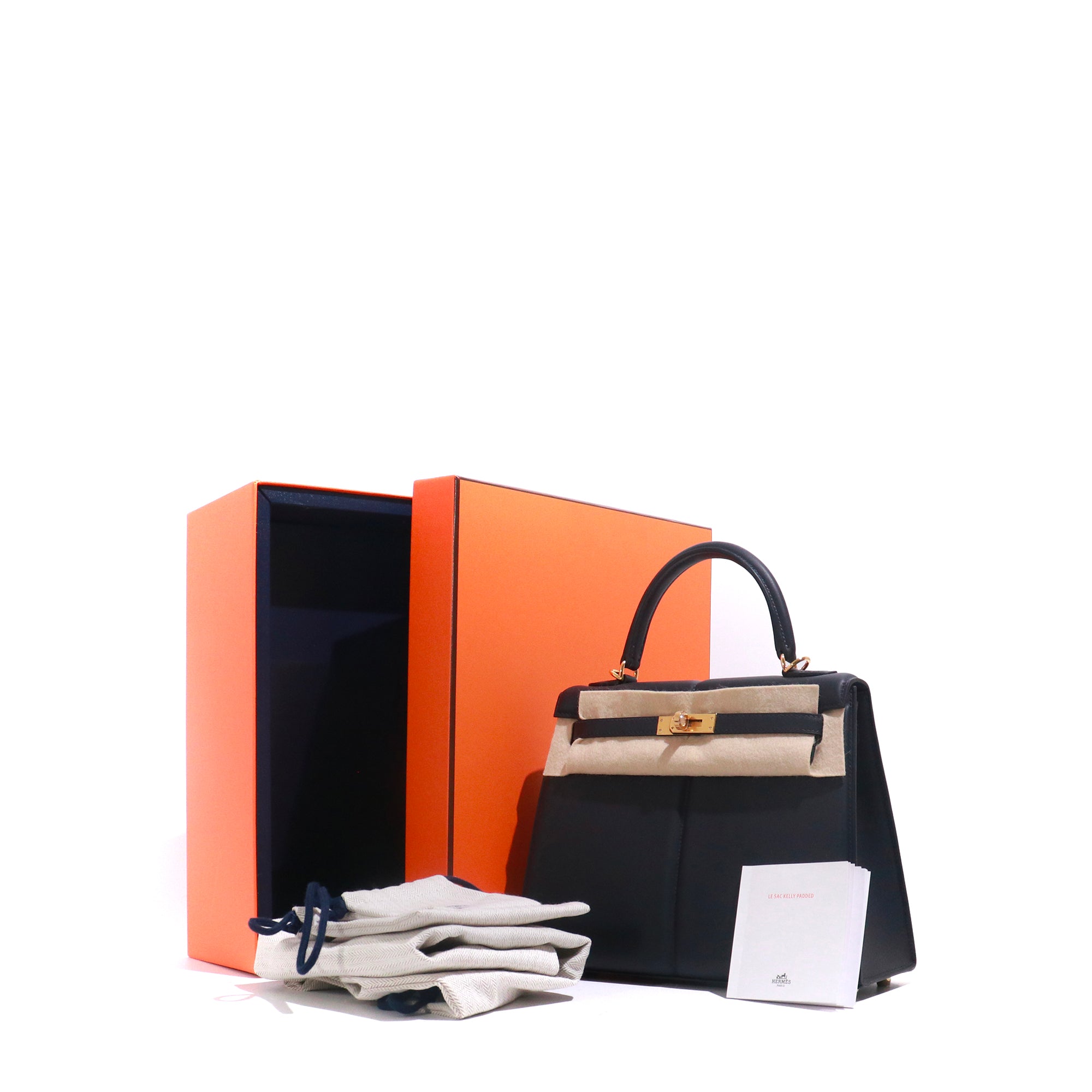 HERMÈS - Sac à main Kelly Padded 25 en cuir Swift Caban bleu marine