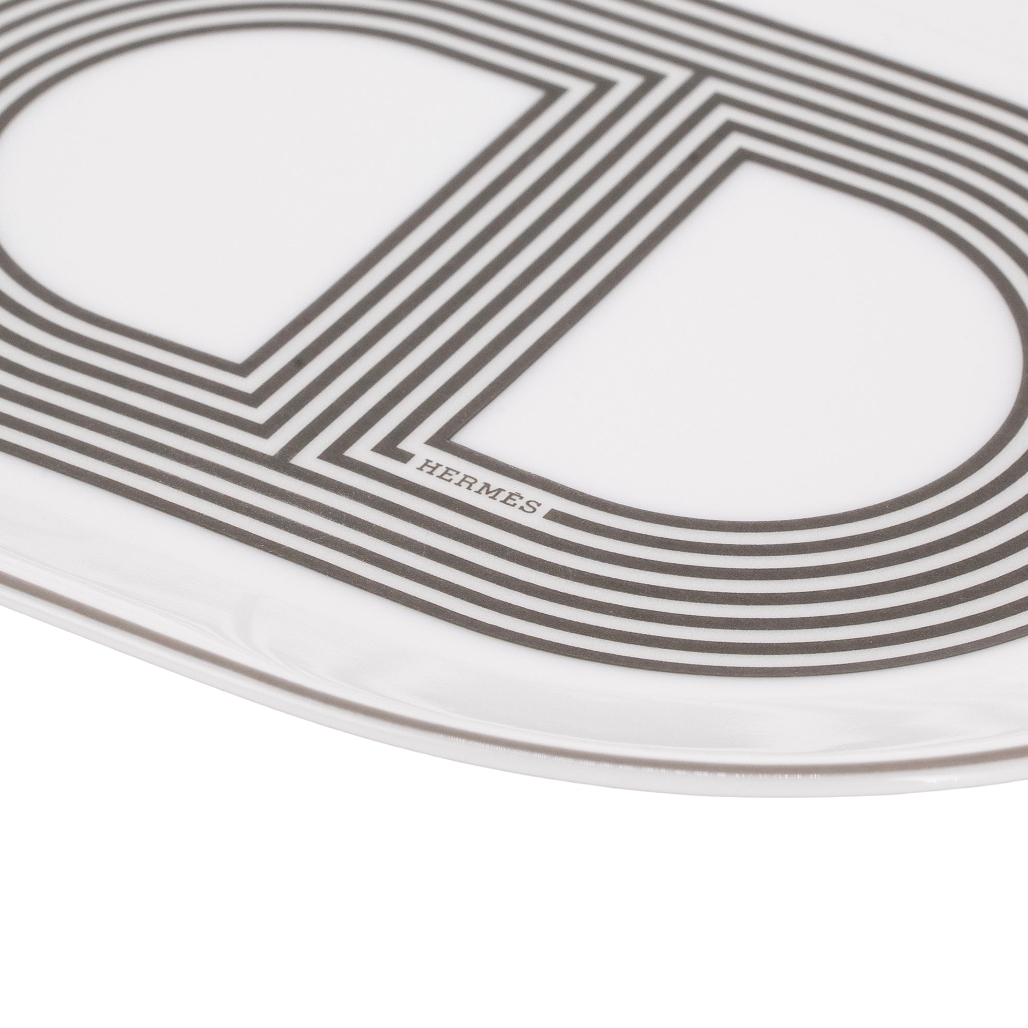 HERMÈS - Assiette Rallye 24 ovale petit modèle blanche