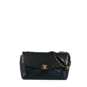 CHANEL - Coco Curve Flap Messenger shoulder bag in black quilted leather