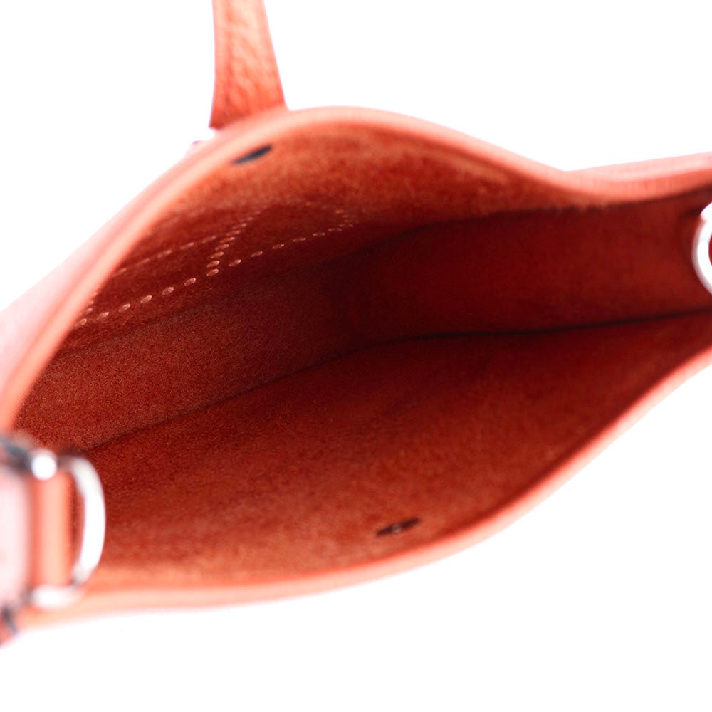 HERMÈS - Sac à bandoulière Evelyne mini en cuir Clémence orange doux