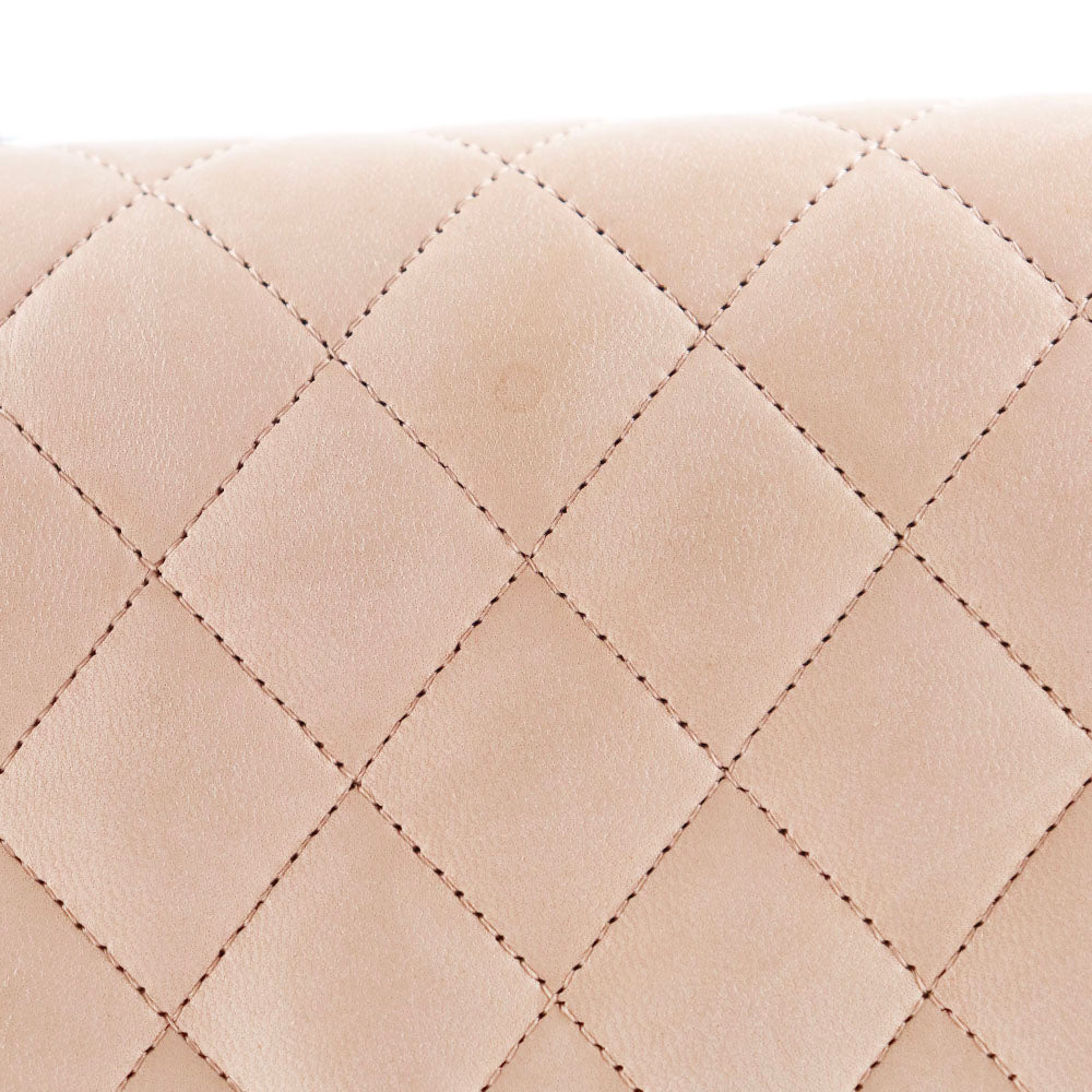 CHANEL - Sac à main Timeless 25 double flap en cuir matelassé beige