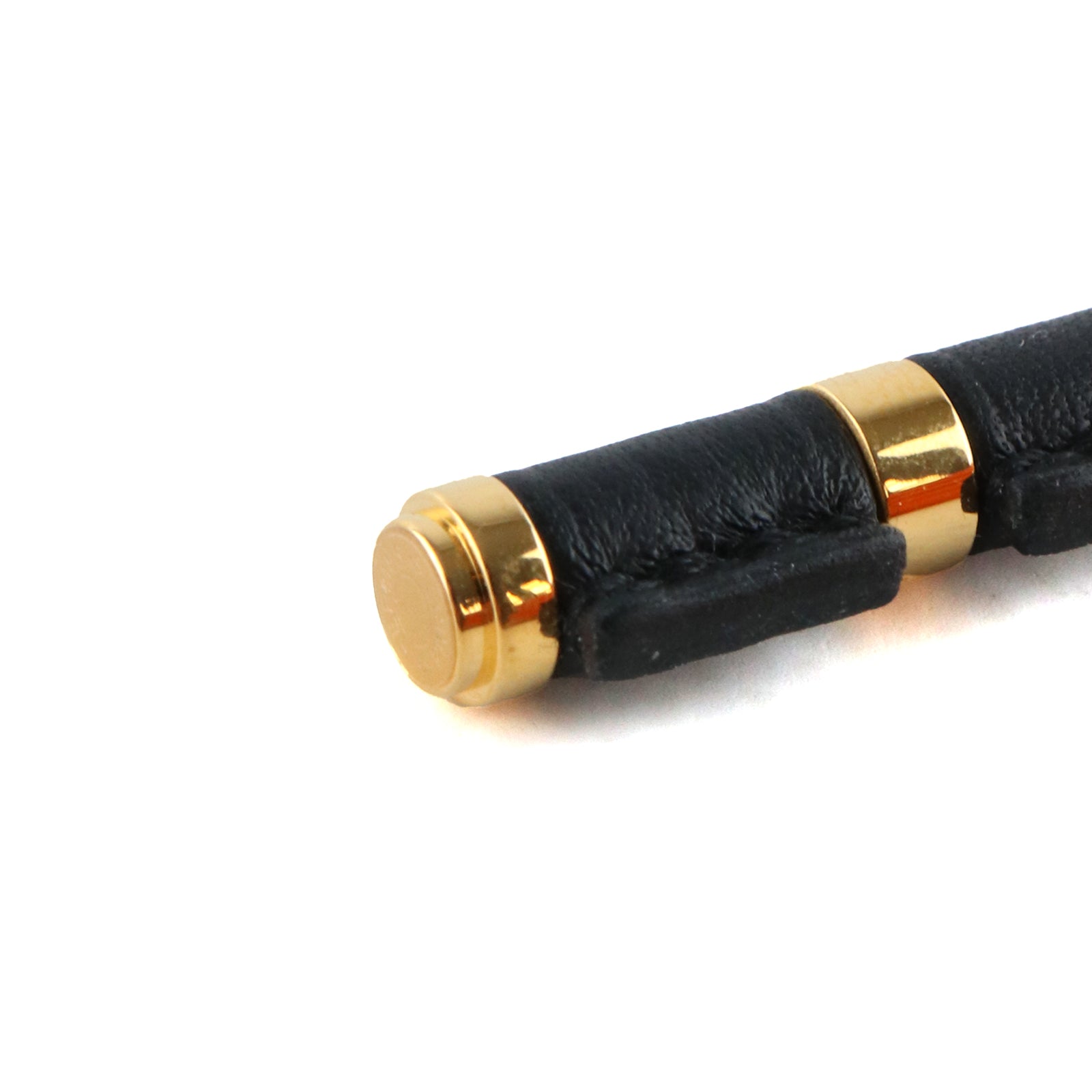 HERMÈS - Gold Hinge earrings and black leather 