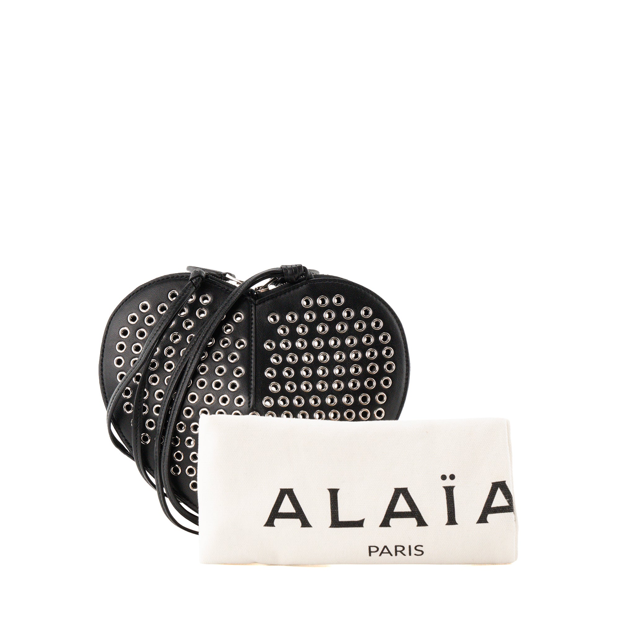 ALAÏA - Sac à bandoulière Le Coeur Alaïa en cuir lisse noir et oeillets argentés
