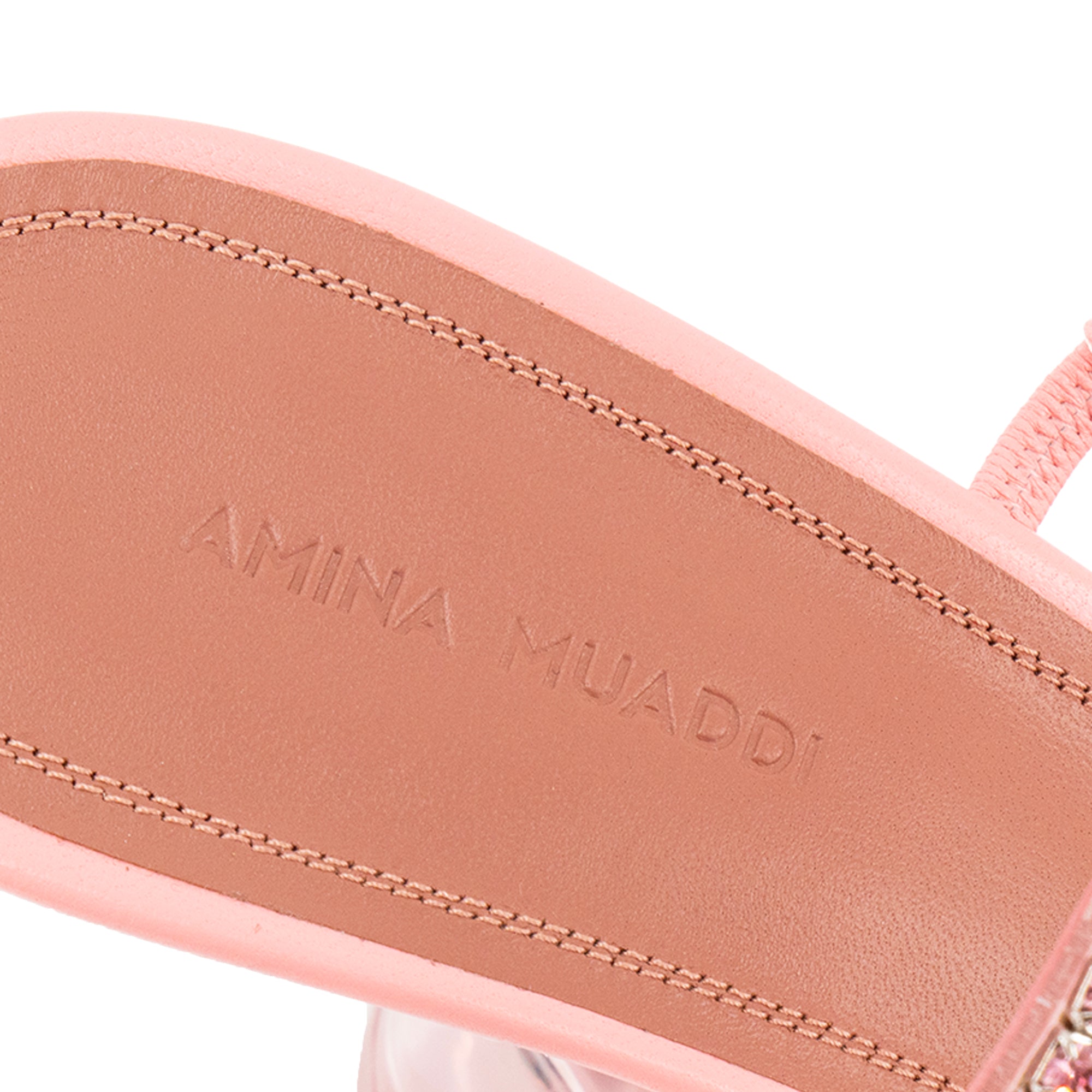 AMINA MUADDI - Mules à talons Gilda Amina Muaddi en PVC et strass roses (T41)