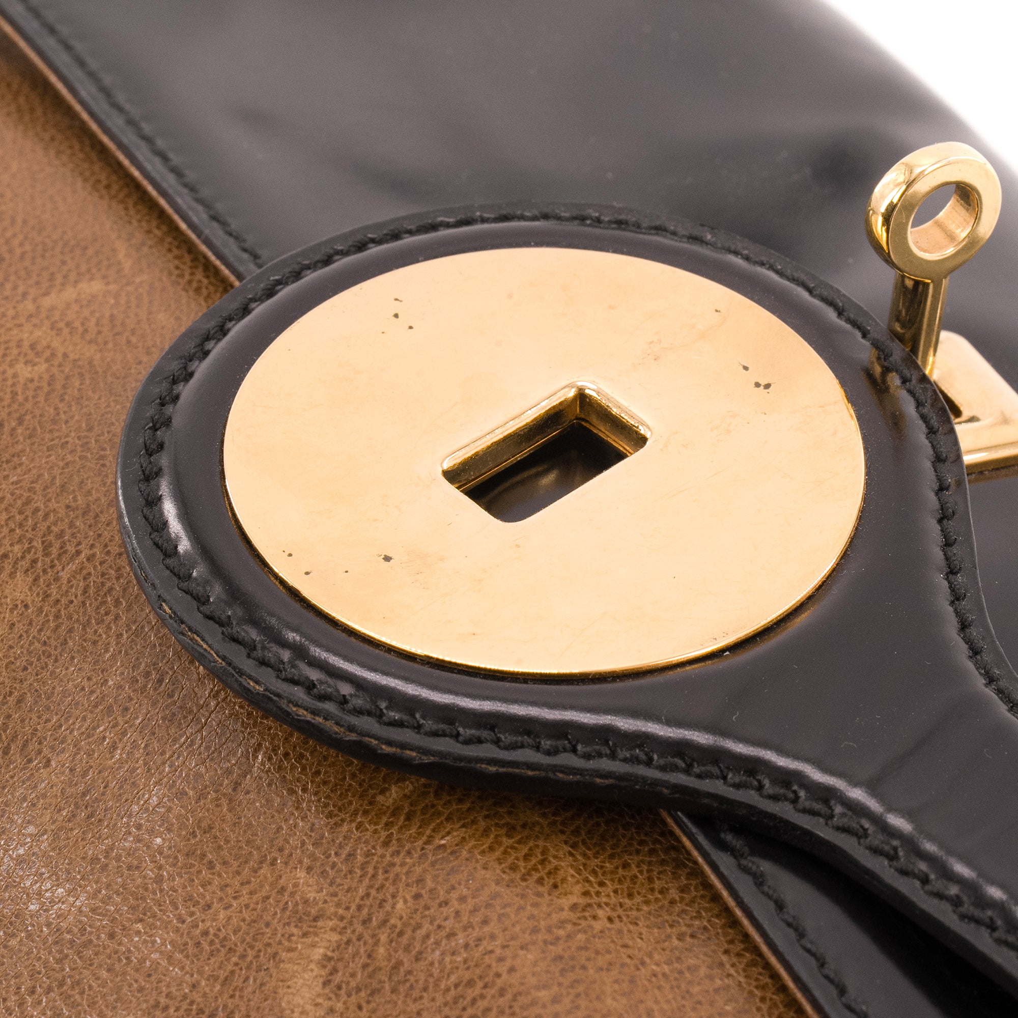 BALENCIAGA - Pochette Balenciaga en cuir noir et marron