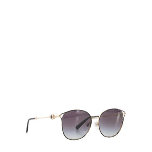 BULGARI - Lunettes de soleil Bulgari en métal doré et noir
