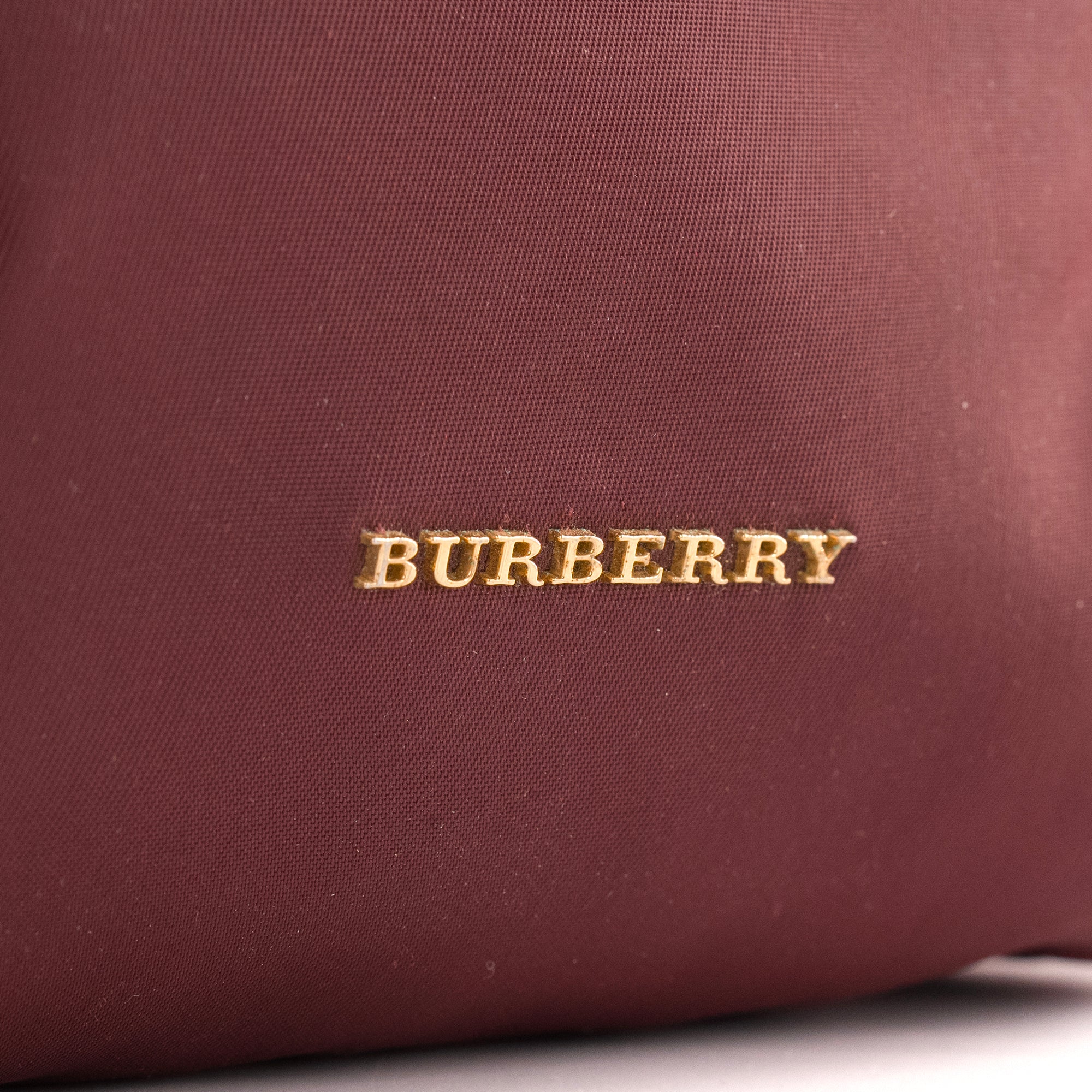 BURBERRY - Sac à dos Burberry en toile bordeaux et cuir noir