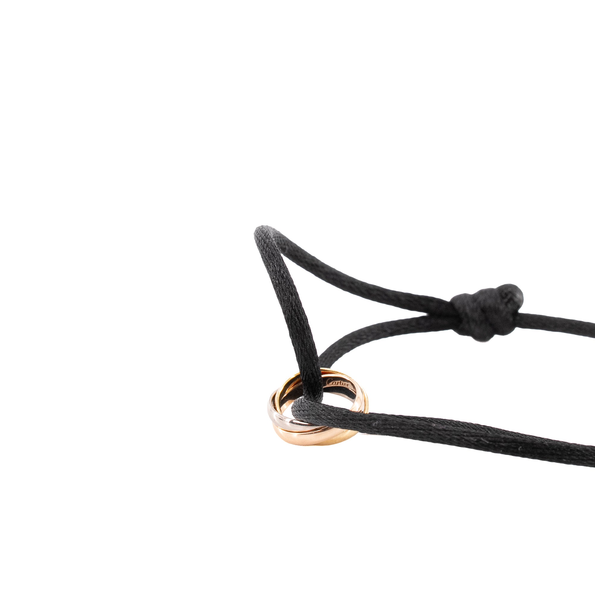 CARTIER - Bracelet Trinity Cartier en cordon noir et trio d'or