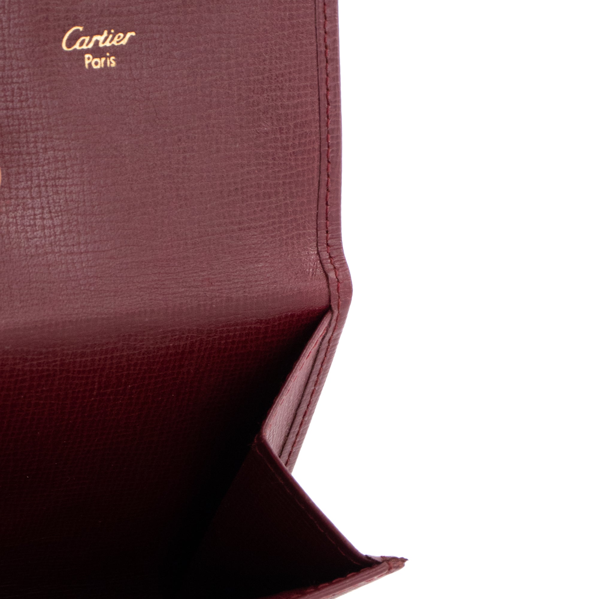 CARTIER - Porte-monnaie Must Cartier en cuir grainé bordeaux
