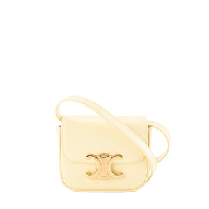 CELINE - Sac à bandoulière Claude Triomphe mini Celine en cuir lisse jaune