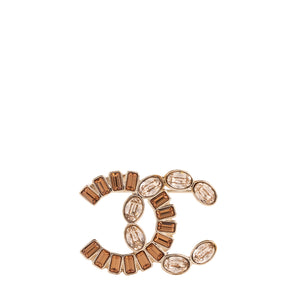 CHANEL - Broche CC Chanel en métal champagne ornée de pierres