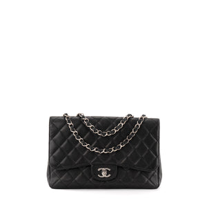 CHANEL - Sac à bandoulière Classique/Timeless Jumbo simple flap Chanel en cuir caviar noir