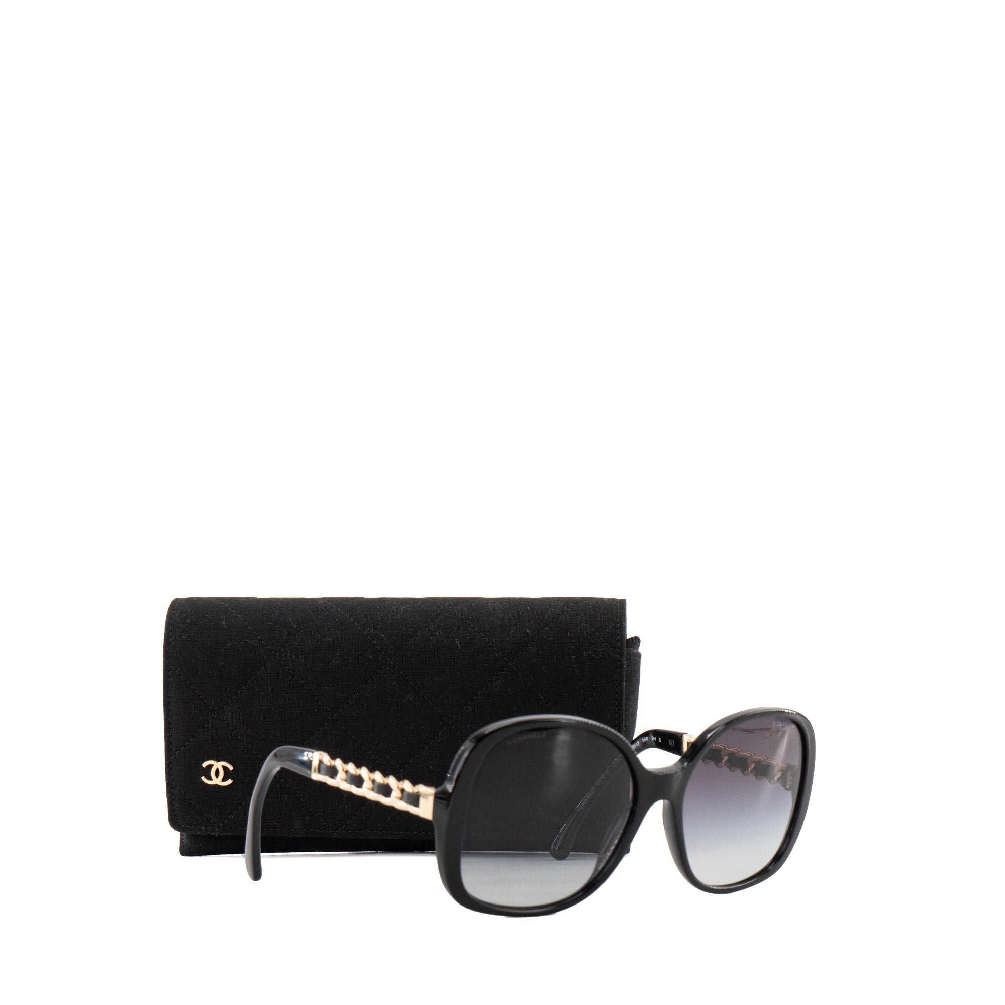CHANEL - Lunettes de soleil Chanel en acétate et cuir lisse noir