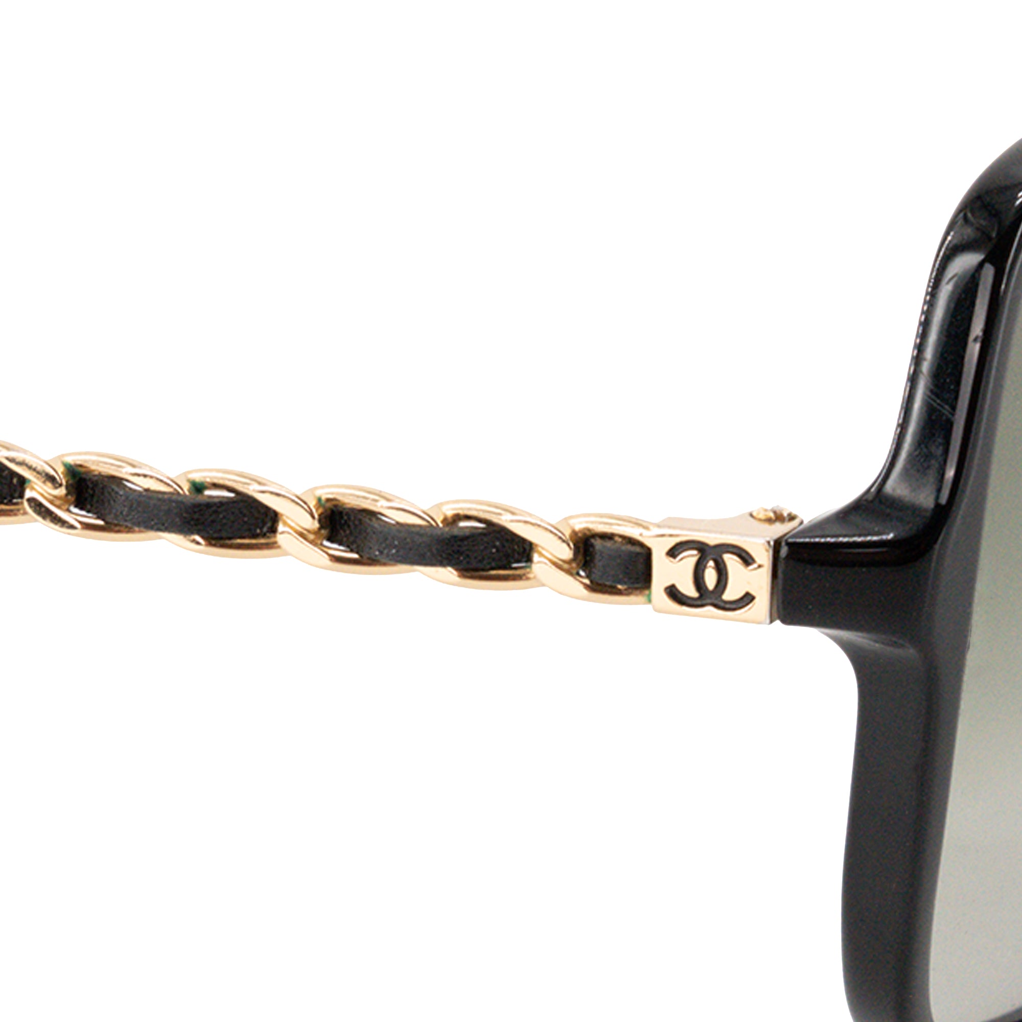 CHANEL - Lunettes de soleil Chanel en acétate et cuir noir