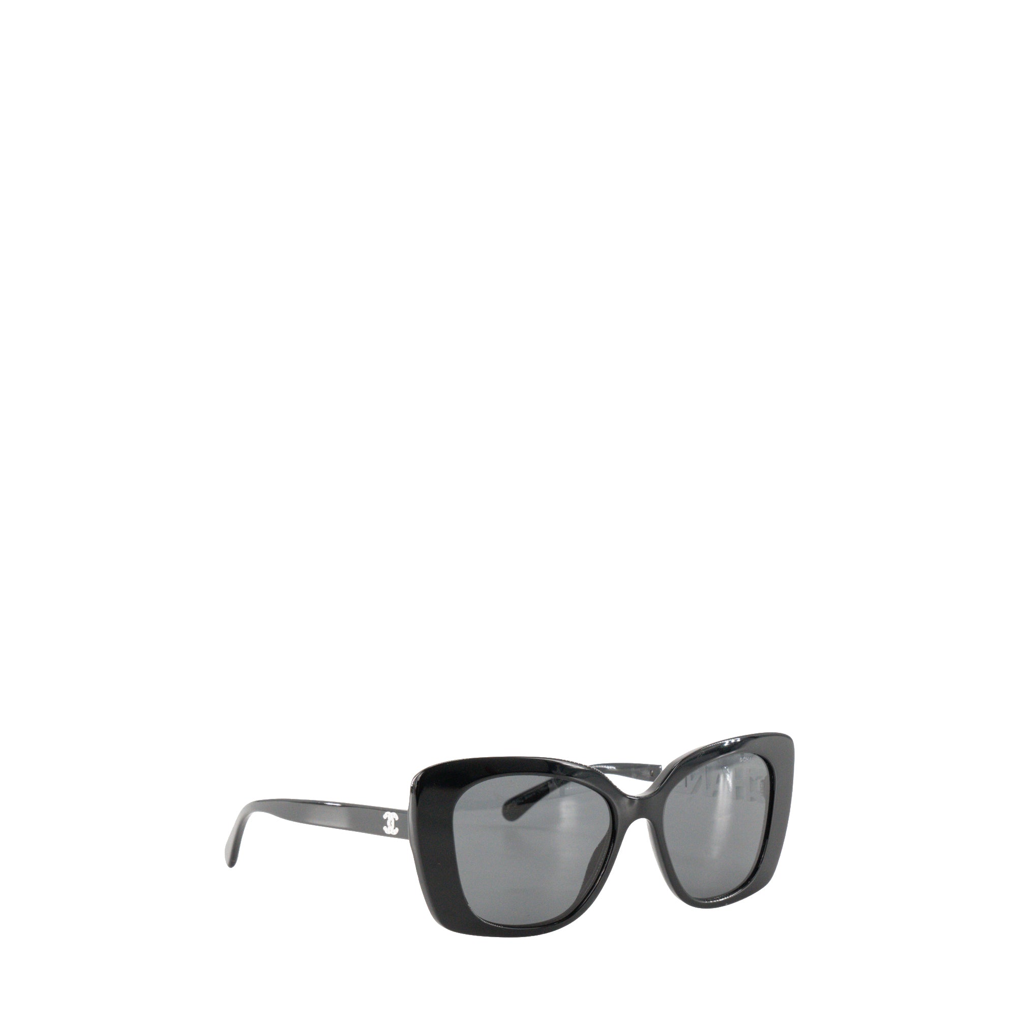 CHANEL - Lunettes de soleil Chanel en acétate noir et blanc ornées de strass