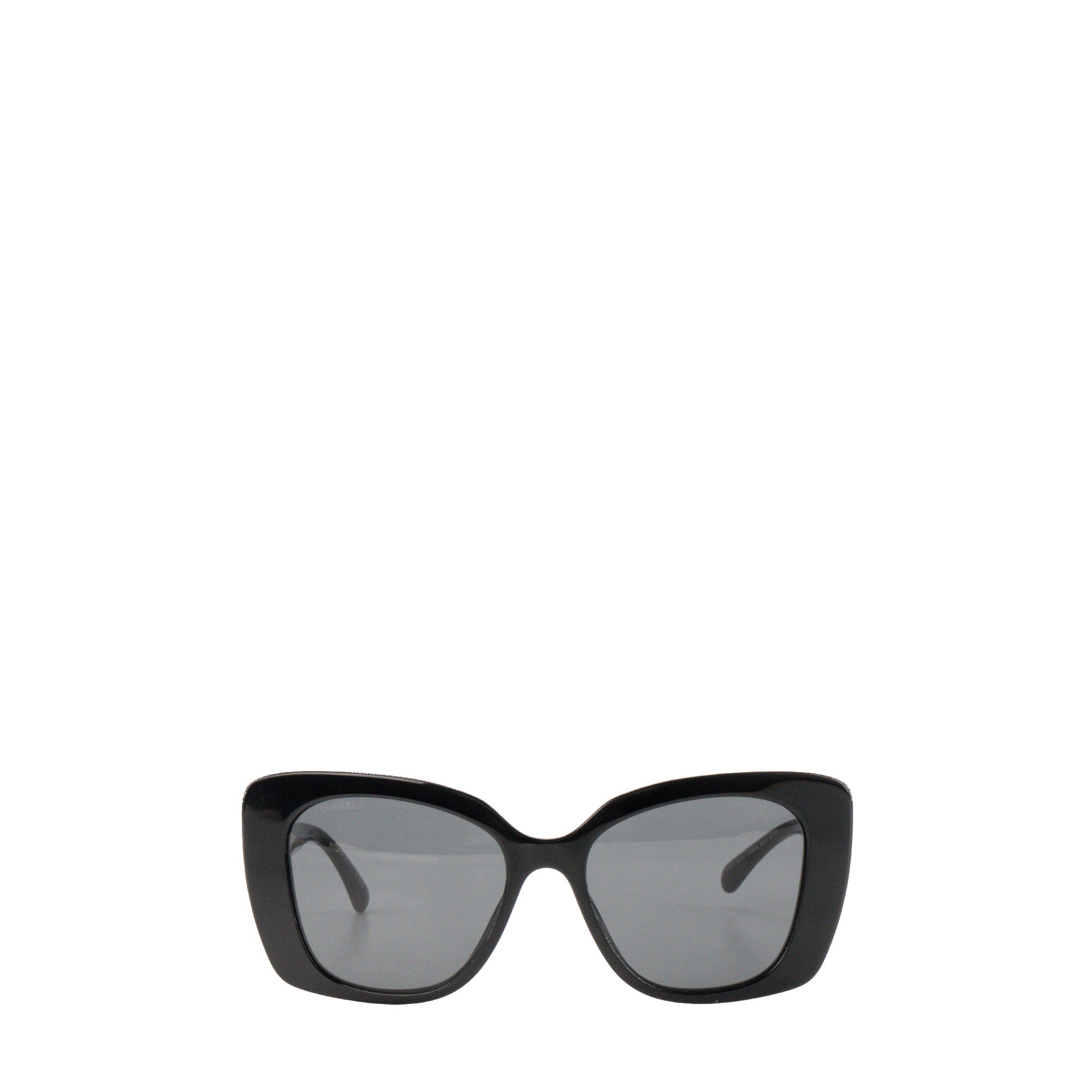 CHANEL - Lunettes de soleil Chanel en acétate noir et blanc ornées de strass