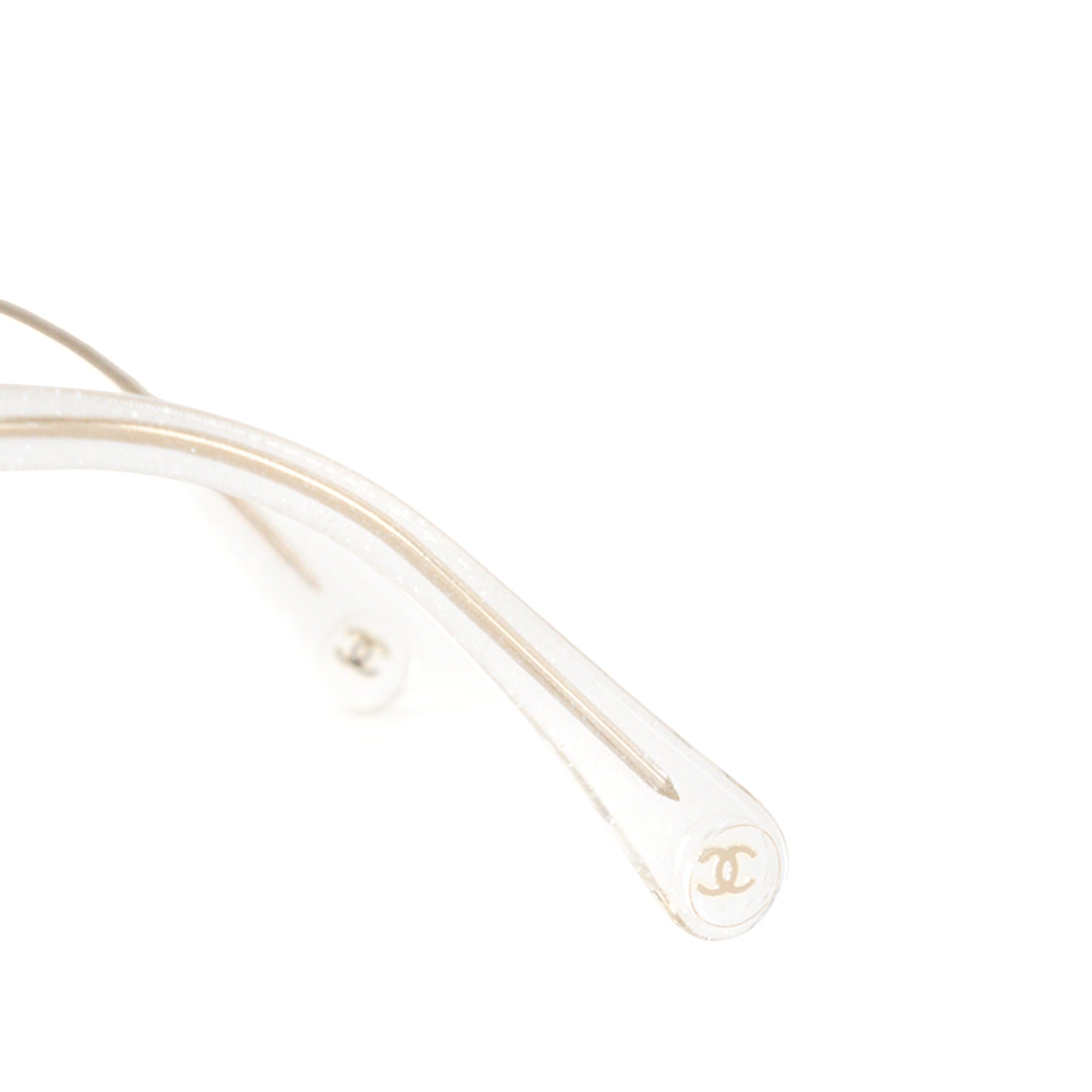 CHANEL - Lunettes de soleil Chanel en acétate transparent à paillettes
