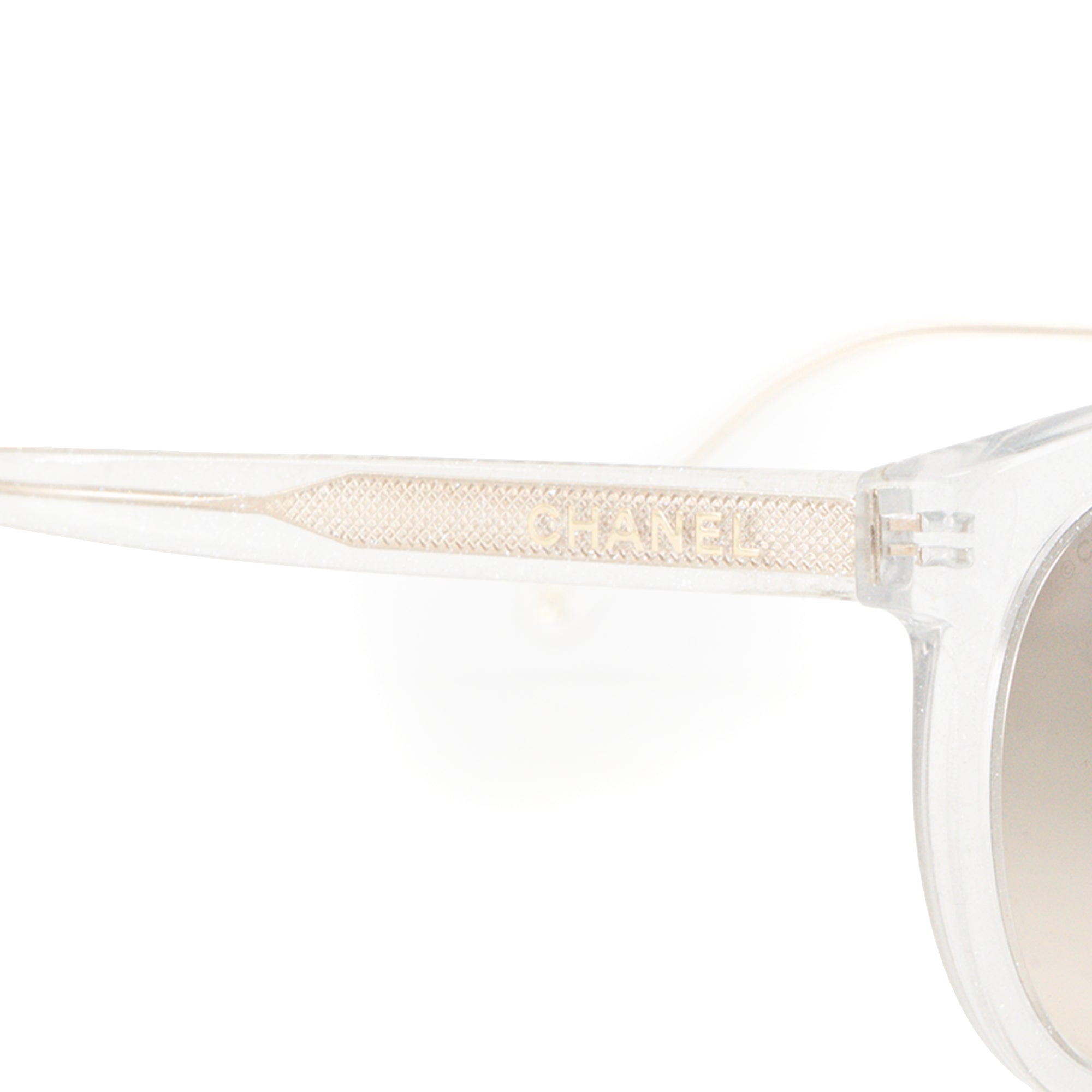 CHANEL - Lunettes de soleil Chanel en acétate transparent à paillettes