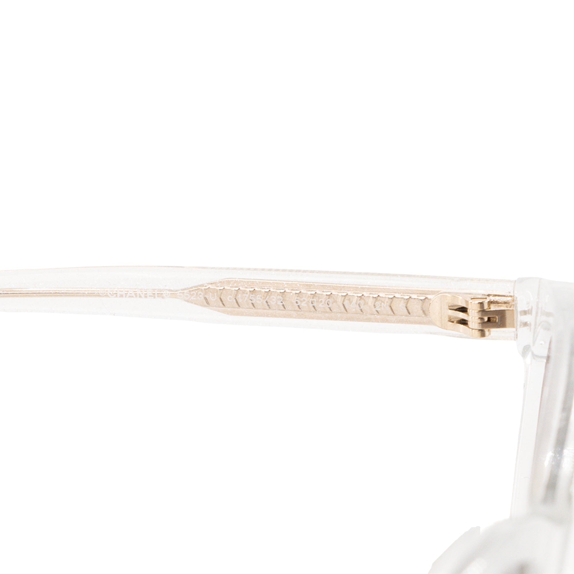 CHANEL - Lunettes de soleil Chanel en acétate transparente et paillettes argentées