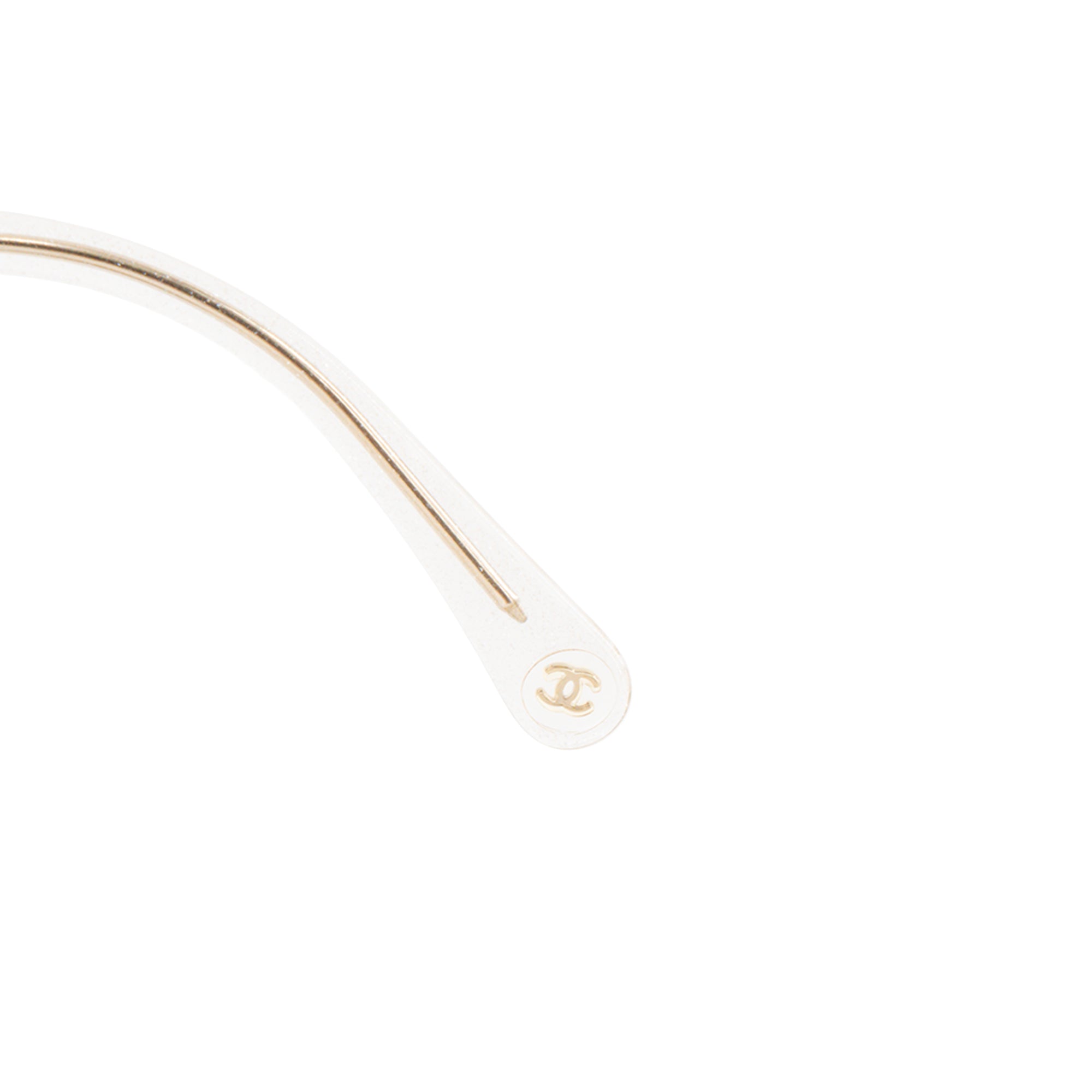 CHANEL - Lunettes de soleil Chanel en acétate transparente et paillettes argentées