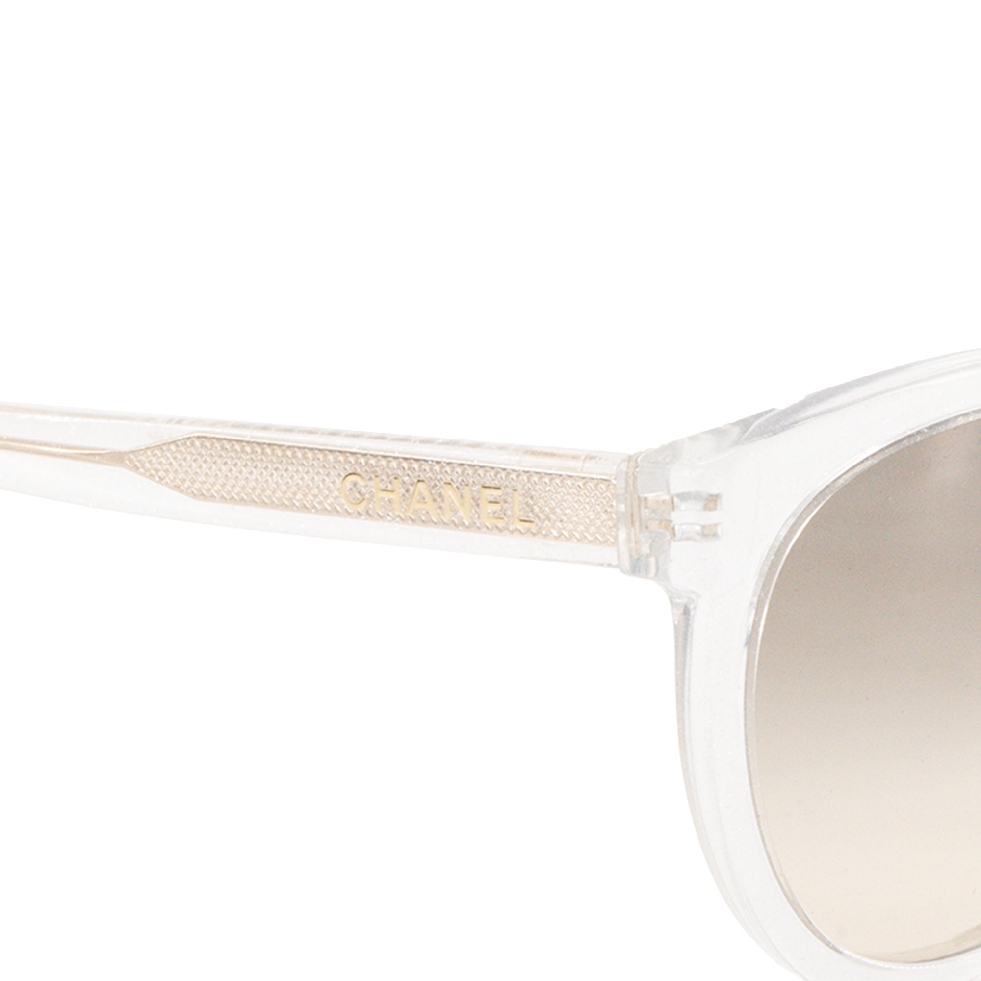 CHANEL - Lunettes de soleil Chanel en acétate transparente et paillettes argentées