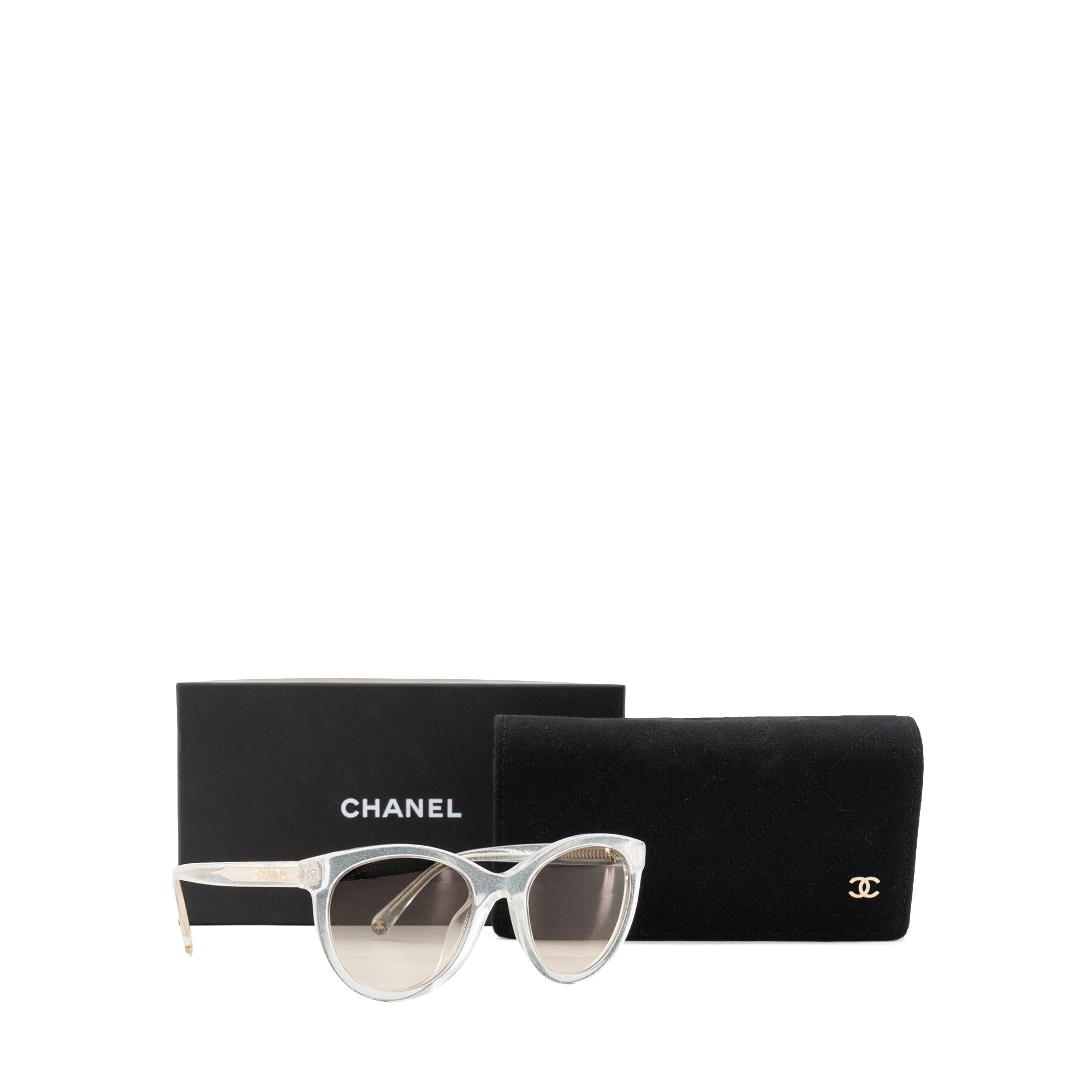 CHANEL - Lunettes de soleil Chanel en acétate transparente et paillettes argentées
