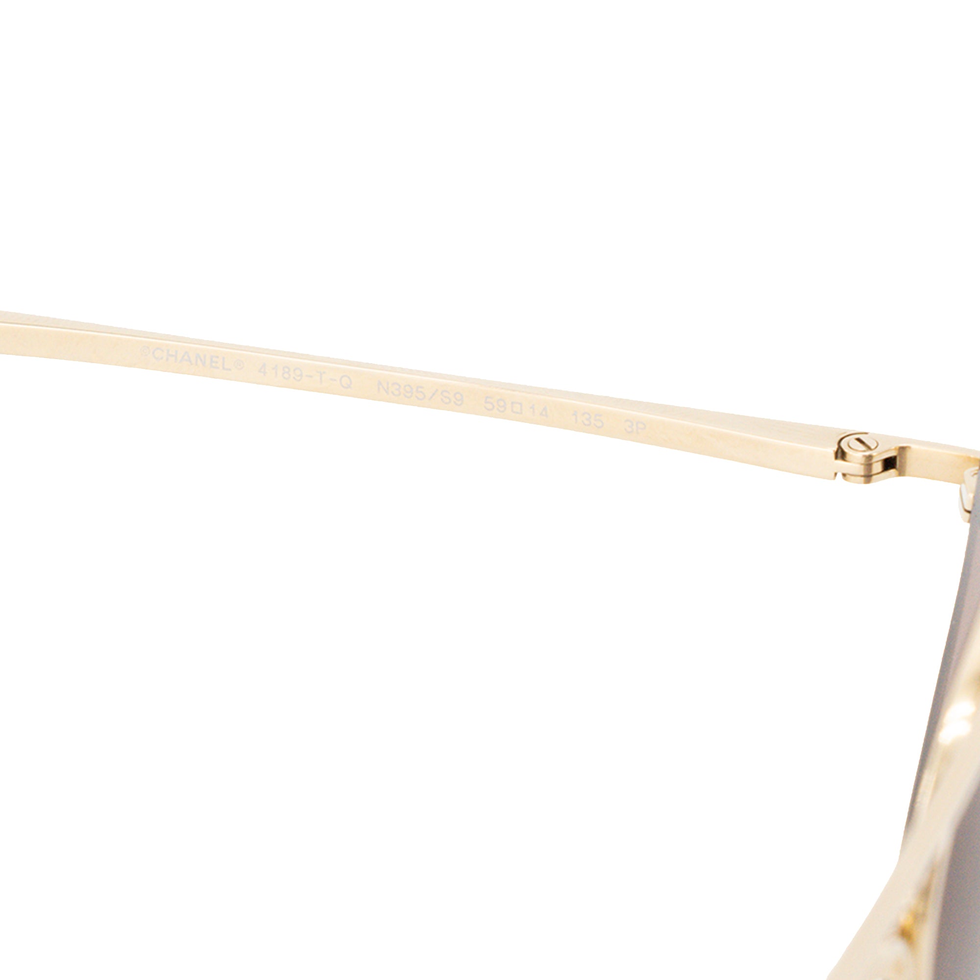CHANEL - Lunettes de soleil Chanel en métal doré