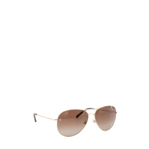 CHANEL - Lunettes de soleil Chanel en métal doré