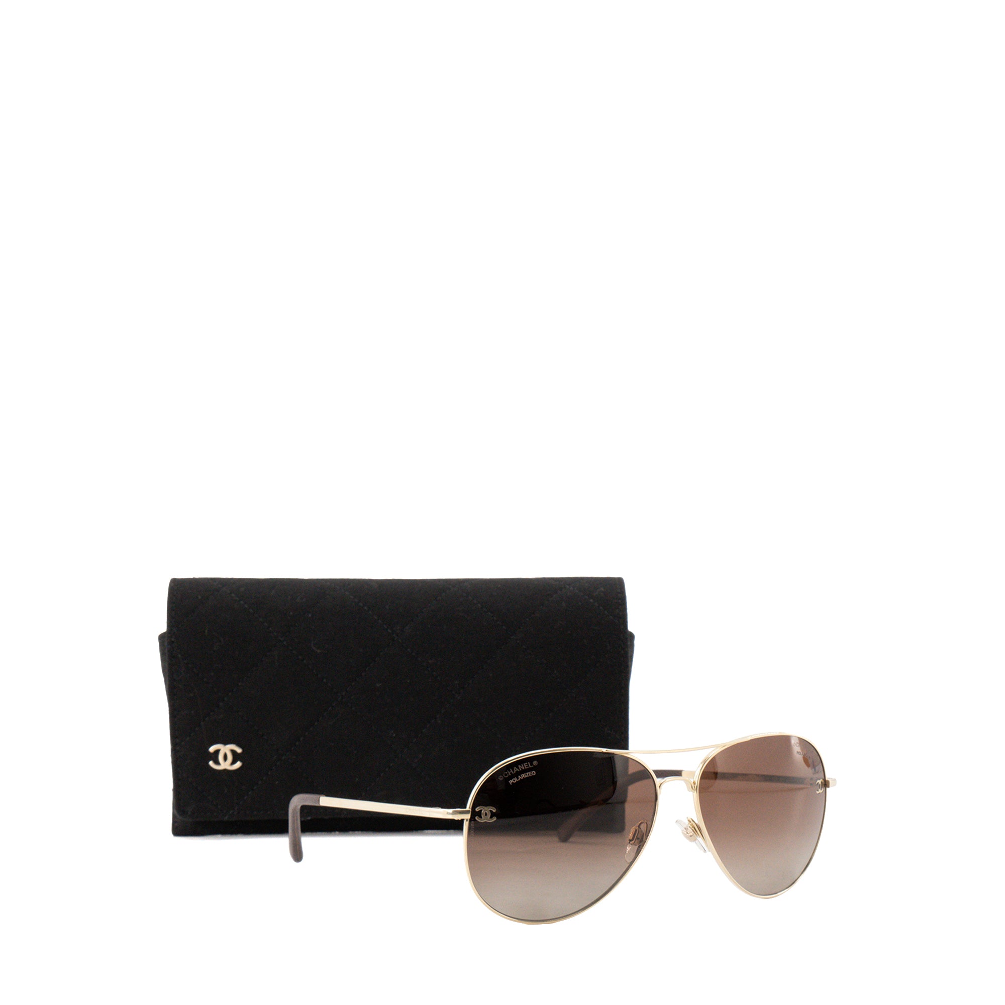 CHANEL - Lunettes de soleil Chanel en métal doré
